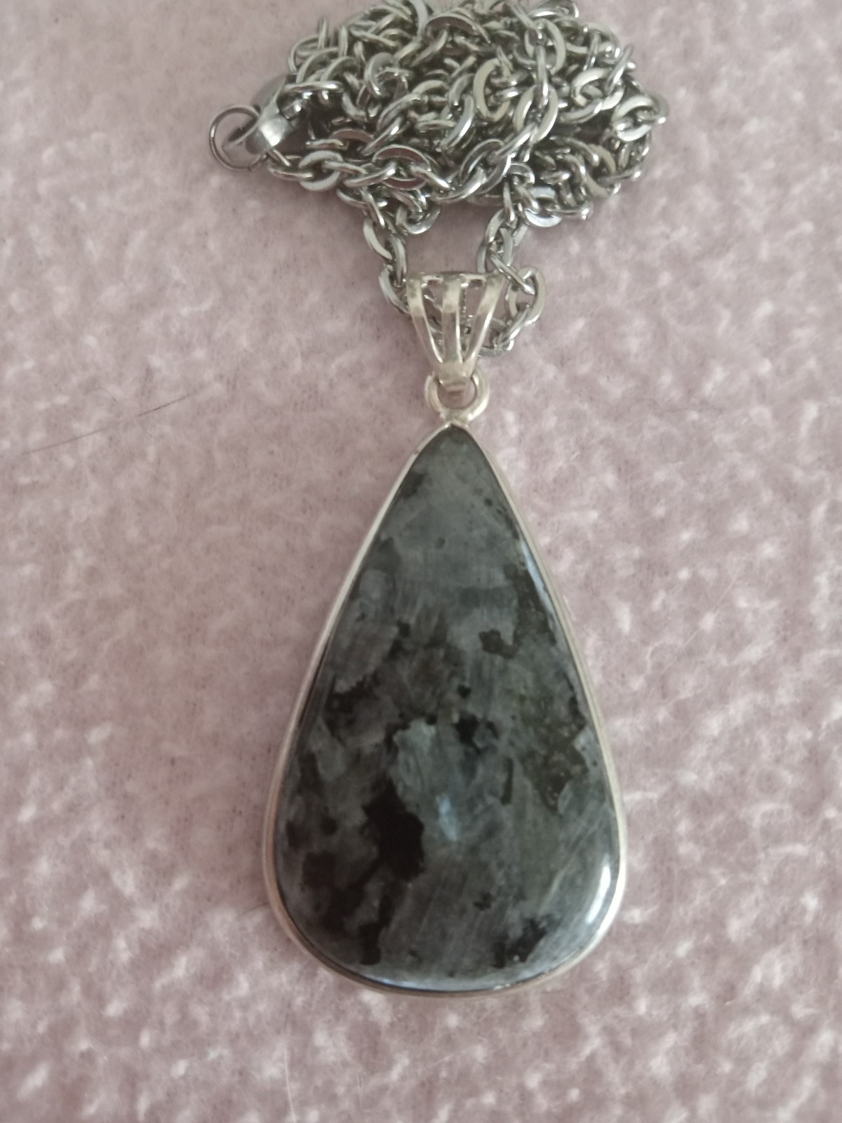 Beautiful Blue Reflective Teardrop Stone Pendant set in silver with chain