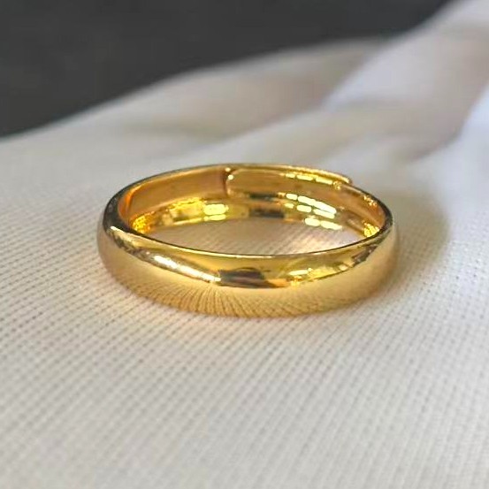 Simple Band Ring Gold-plated (NOT SURE) marked ‘ 999 ‘, Size 9 adjustable