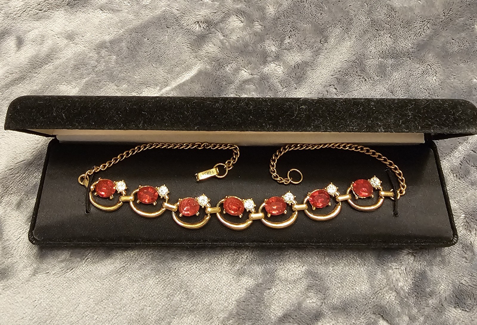 Lisner Signed Gold Tone Red Crystal Curb Link Chain Bracelet Lobster Clasp