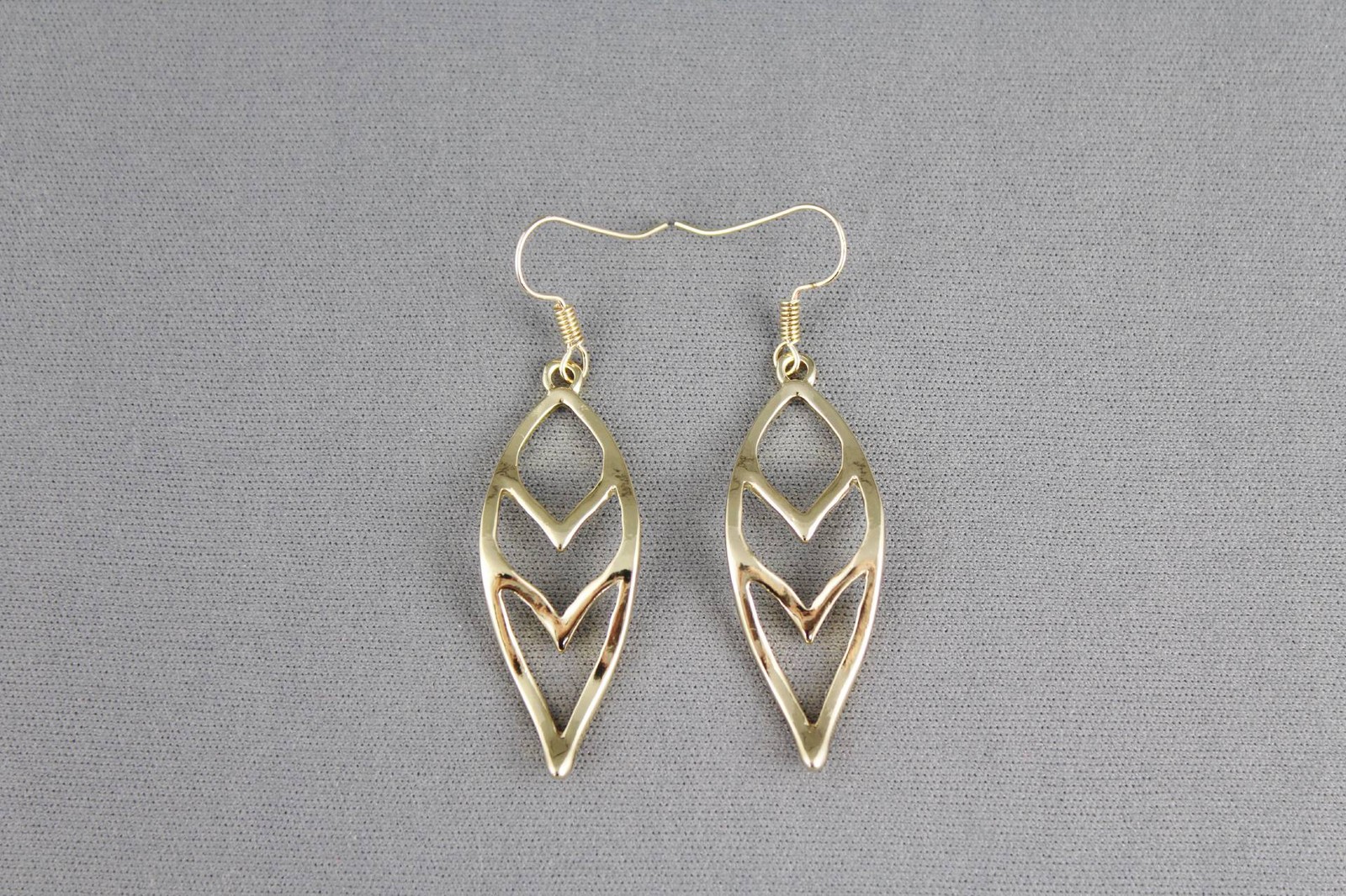gold tone teardrop dangle earrings chevron V pattern 2.25 inches long liteweight