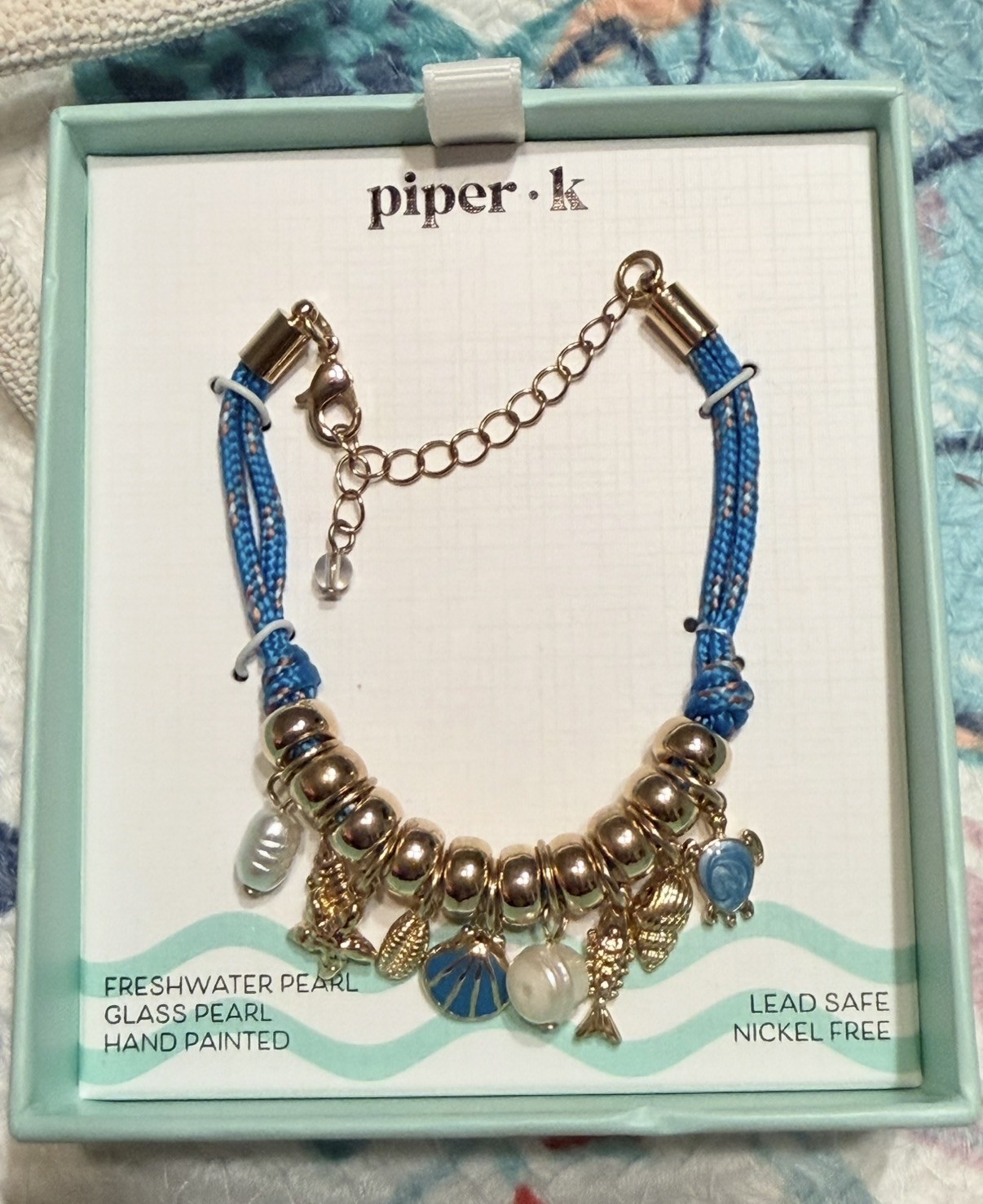 PIPER•K Beach Bracelet Seashell, Fish Starfish, Turtle, & Pearl Blue Cord