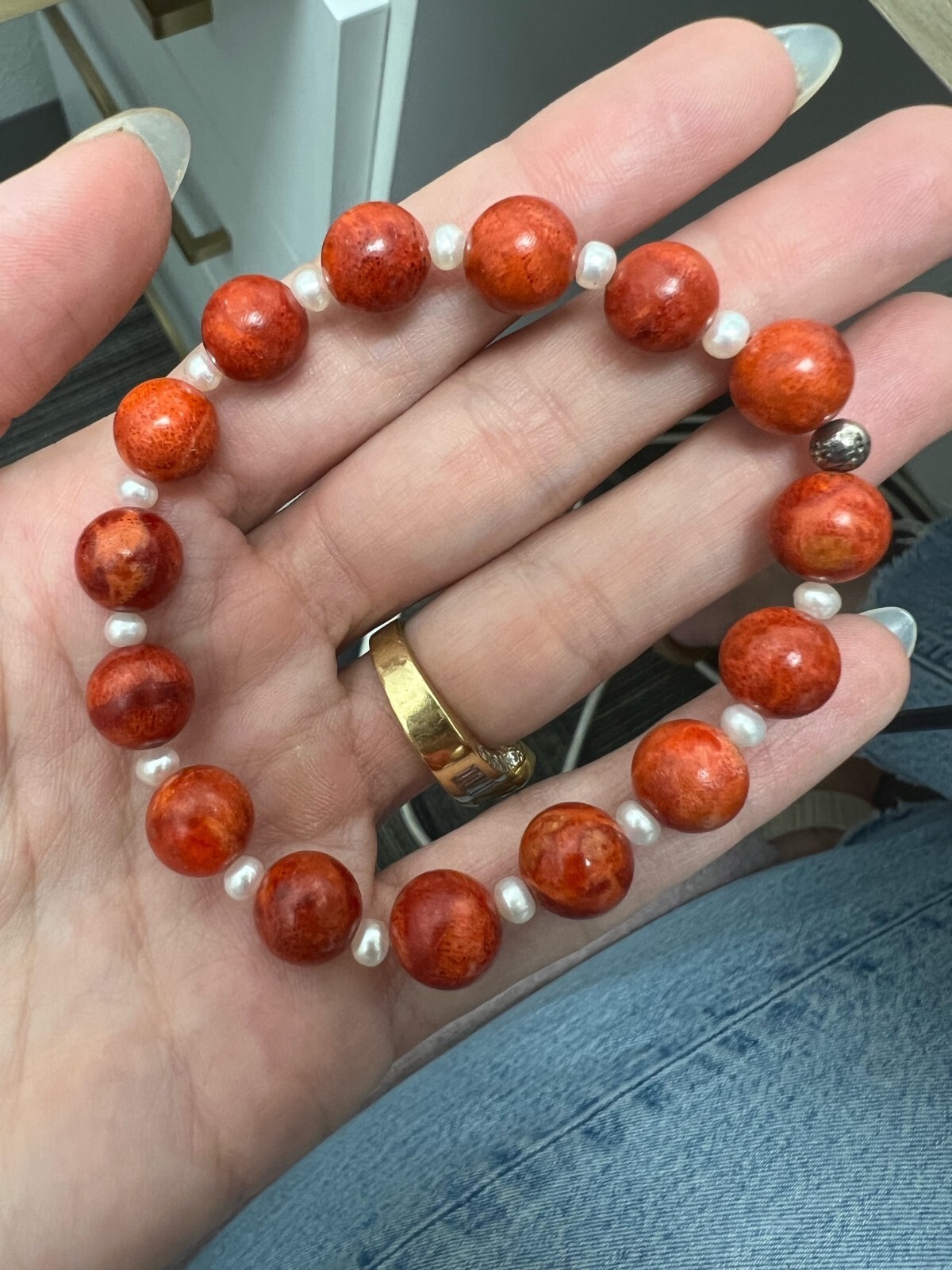 beadedbstrech bracelet, orange. Jasper/coral/goldsand- not sure which one