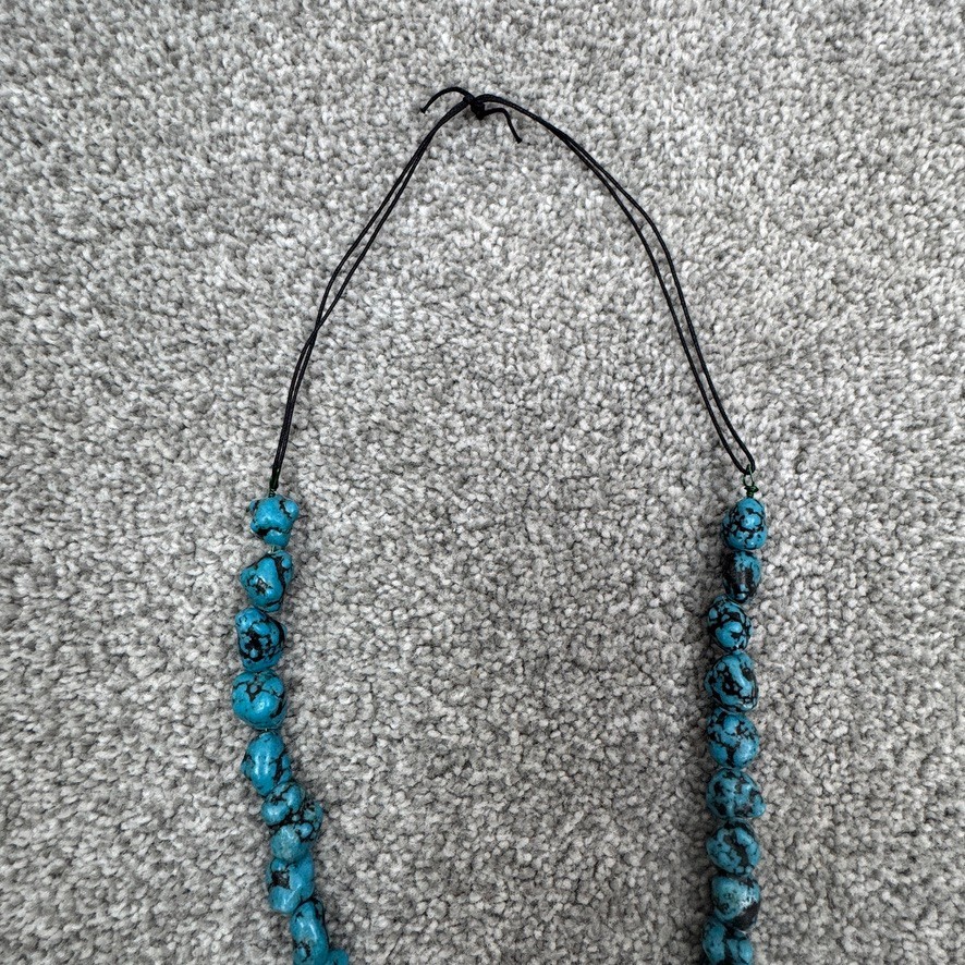 Handmade Necklace With Bone Pendant Wrapped In Beading On Blue Speckled Stones