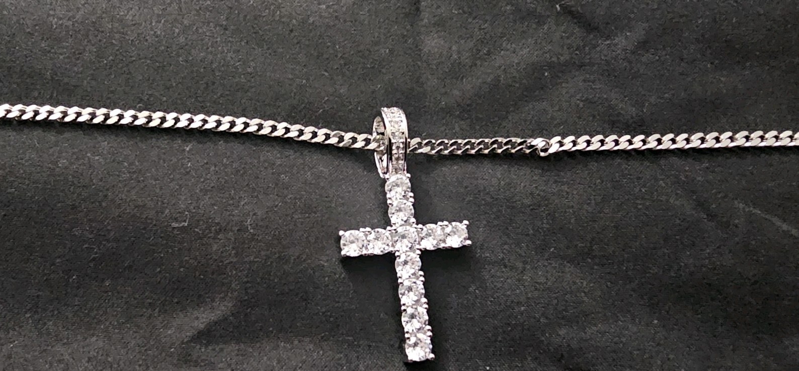 20in. 2.4mm stainless stl chain w/ a Silver plated Cross Pendant 11 prong set CZ