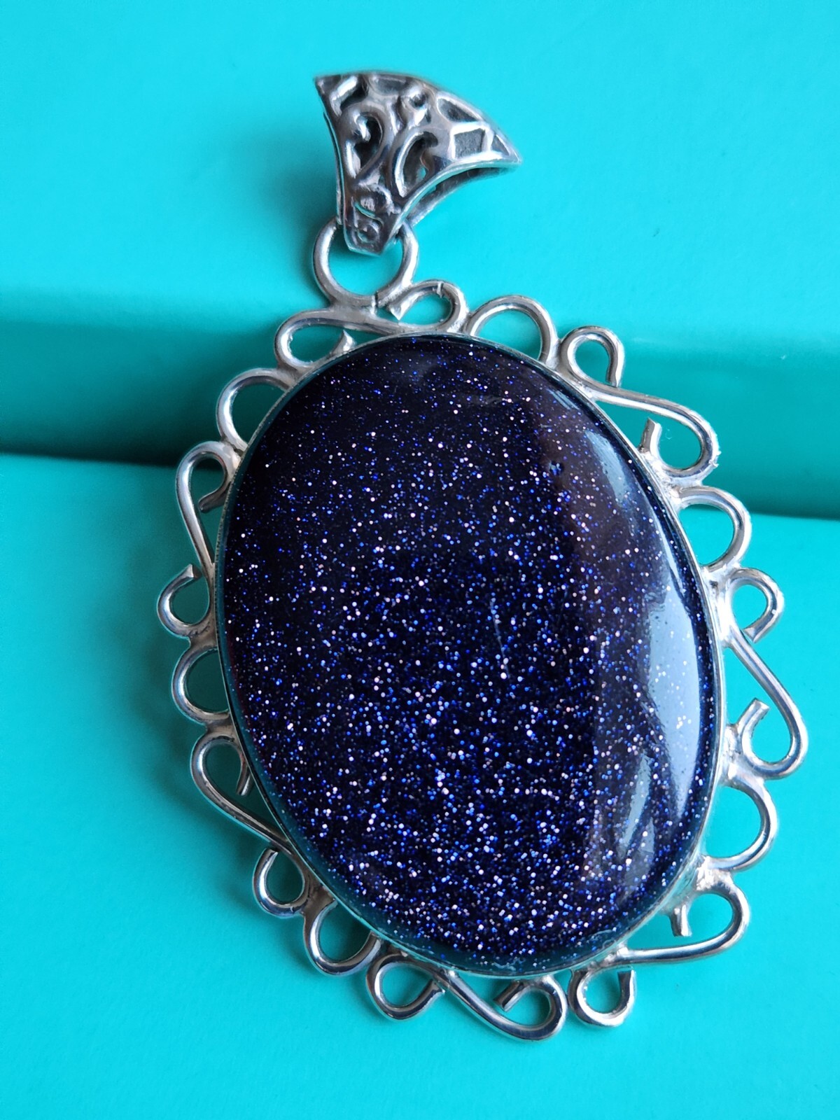 BLUE GOLDSTONE STERLING SILVER PENDANT, 17 GRAMS