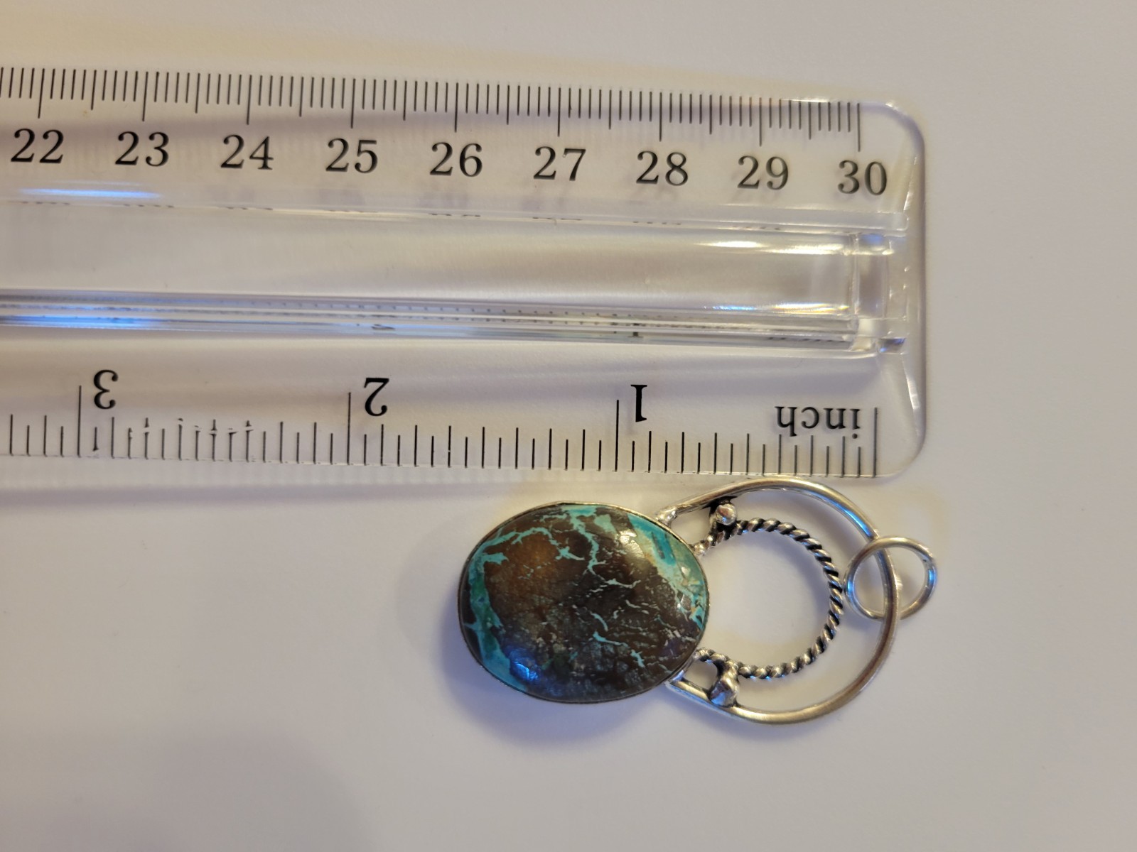 New 925 sterling silver pendant featuring an oval turquoise with Dark Matrix