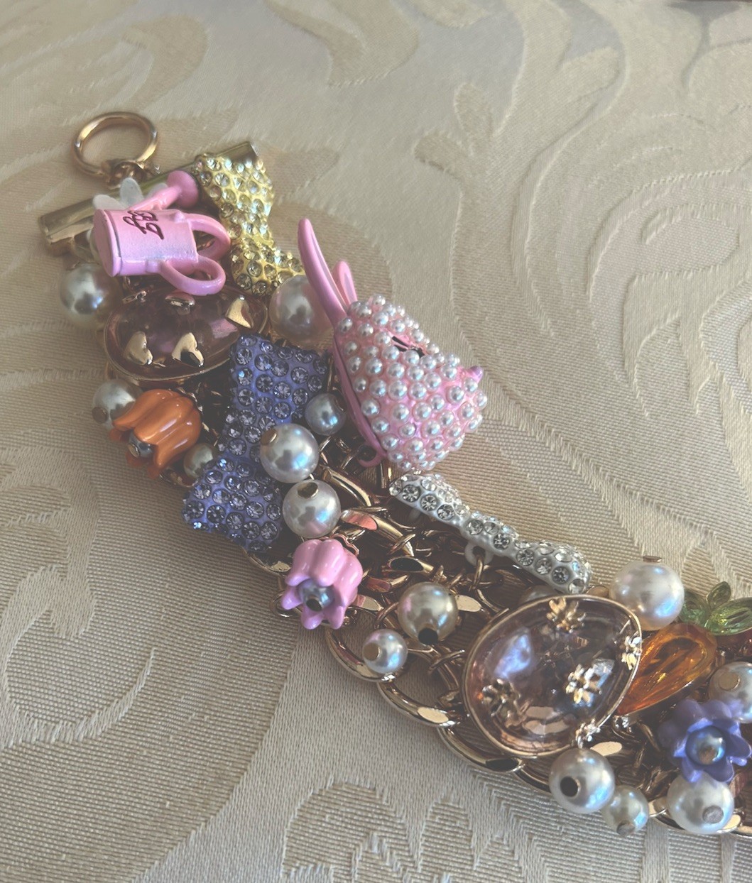 NEW Betsey Johnson Goldtone Easter Egg Bunny Tulip Bow Daisy Charm Bracelet