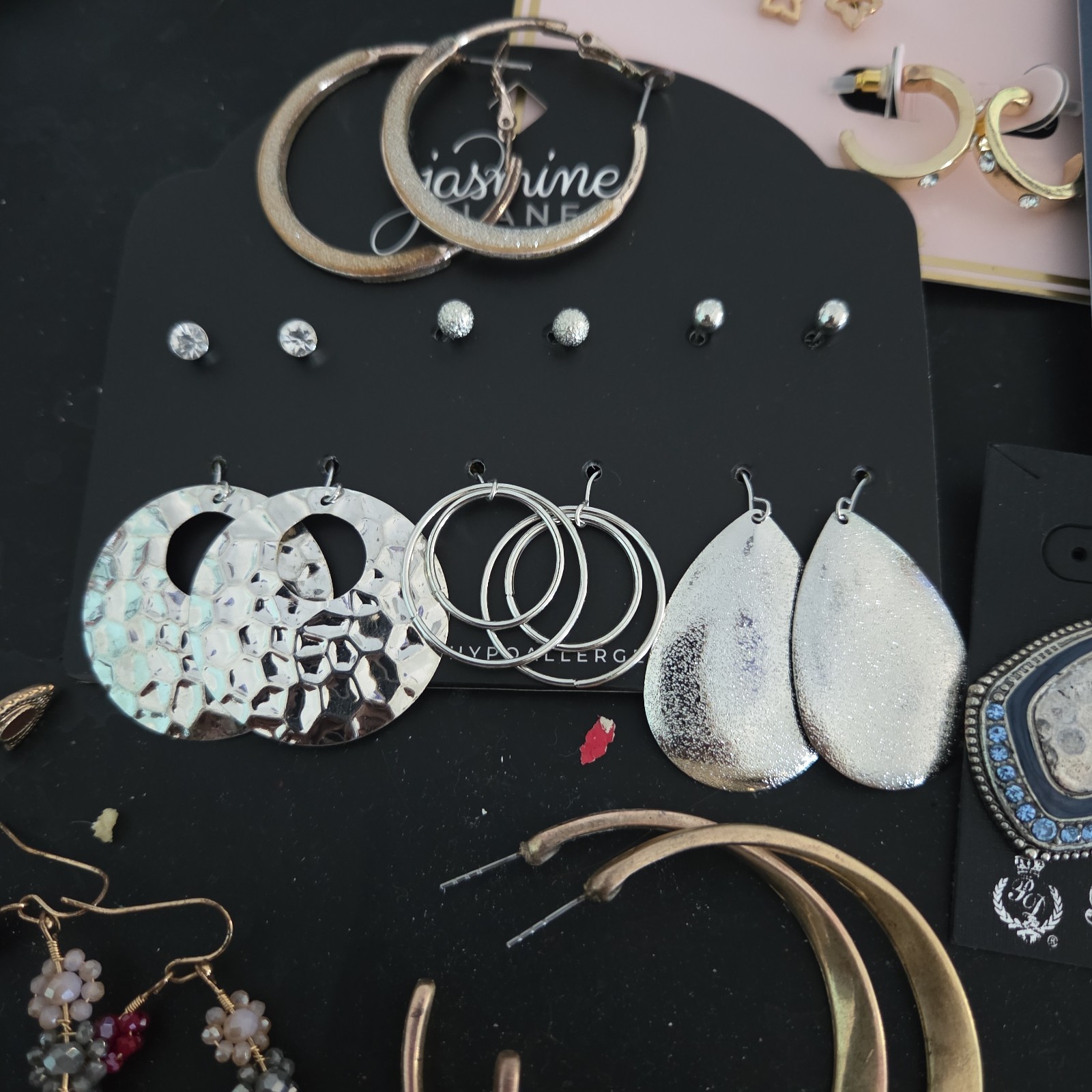 Lot of New & Used Earrings . Mixed colors and models.