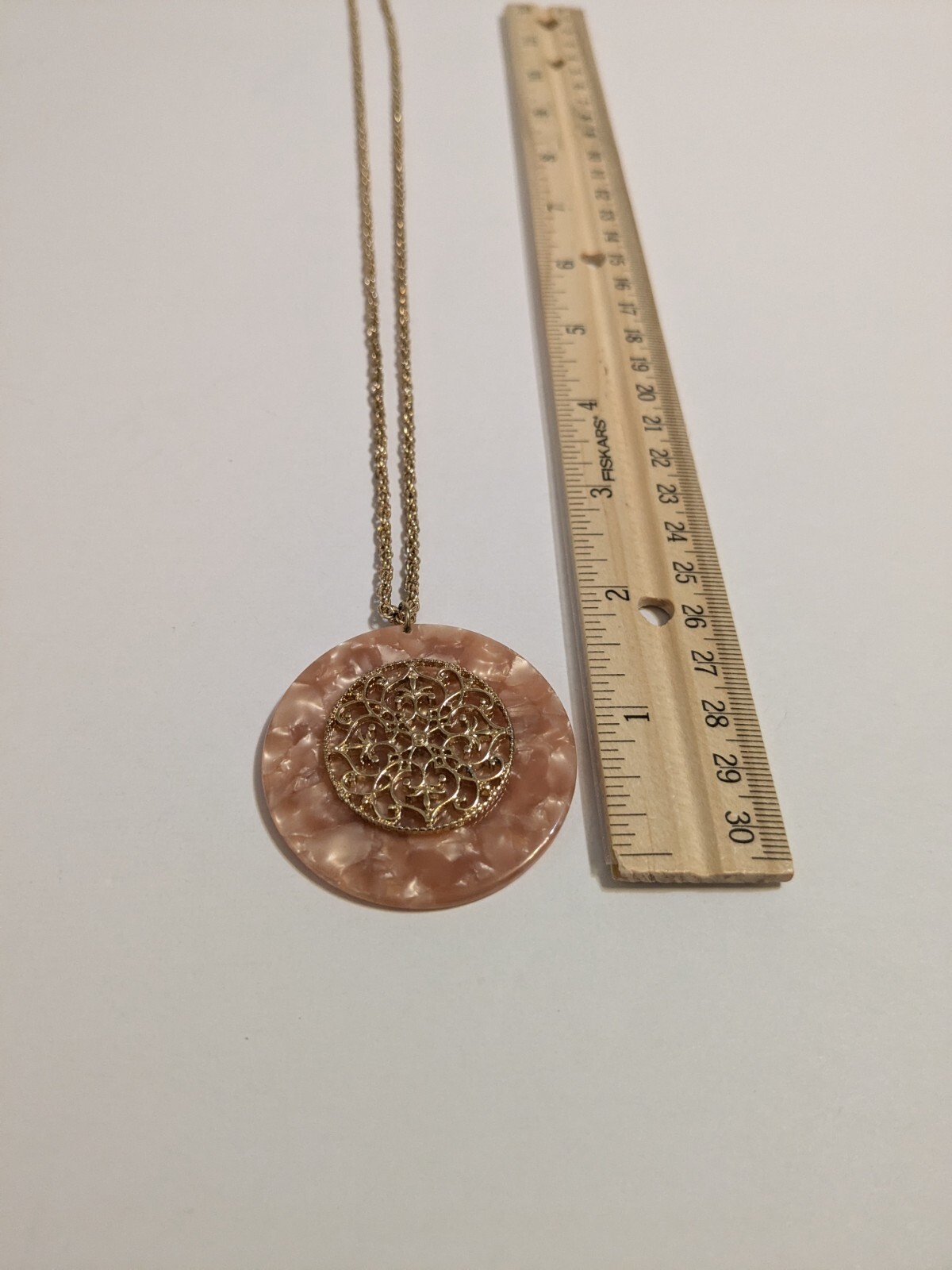 Peach Faux Shell Medallion Pendant Gold Tone Necklace. Metal Scroll Work. 30″.