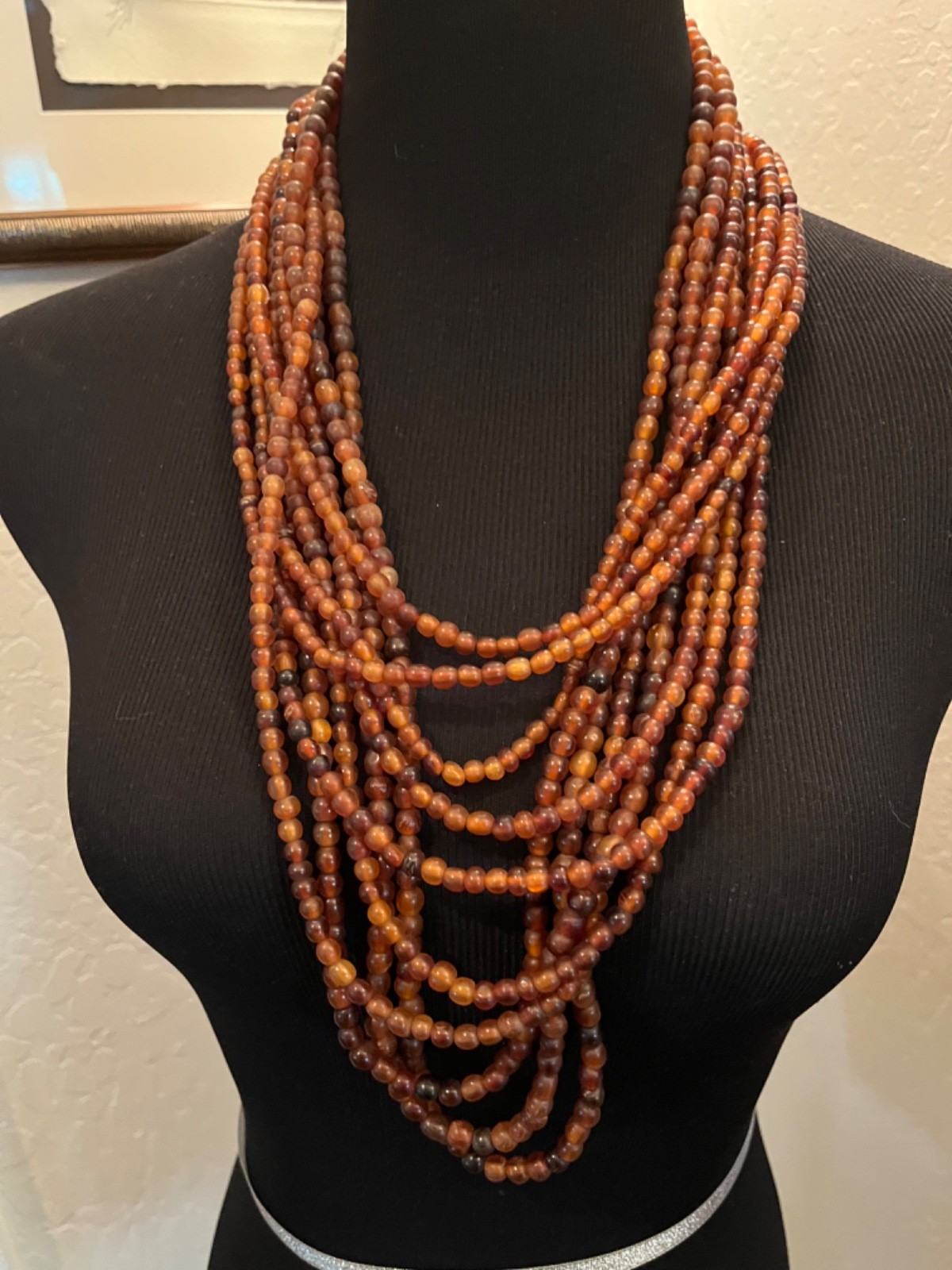 Multilayer warm brown draped necklace possibly acrylic brown clasp