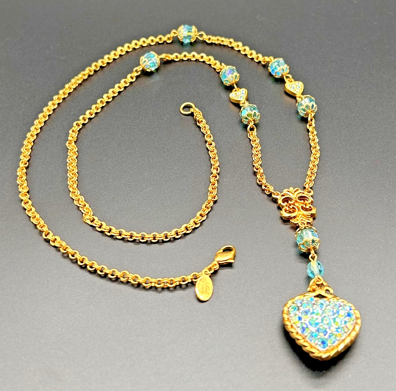 Vintage 1990s Kirks Folly Gold Tone Aurora Borealis Blue Crystal Heart Pendant