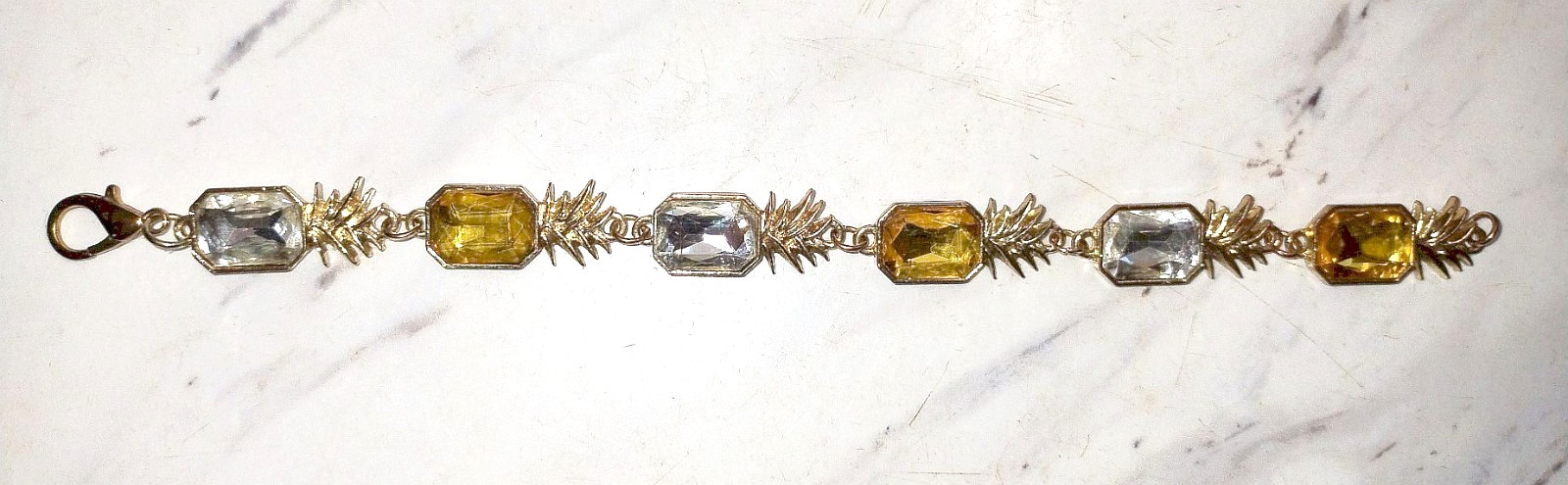 Sparkly amber yellow & clear crystals in gold tone pineapples link bracelet