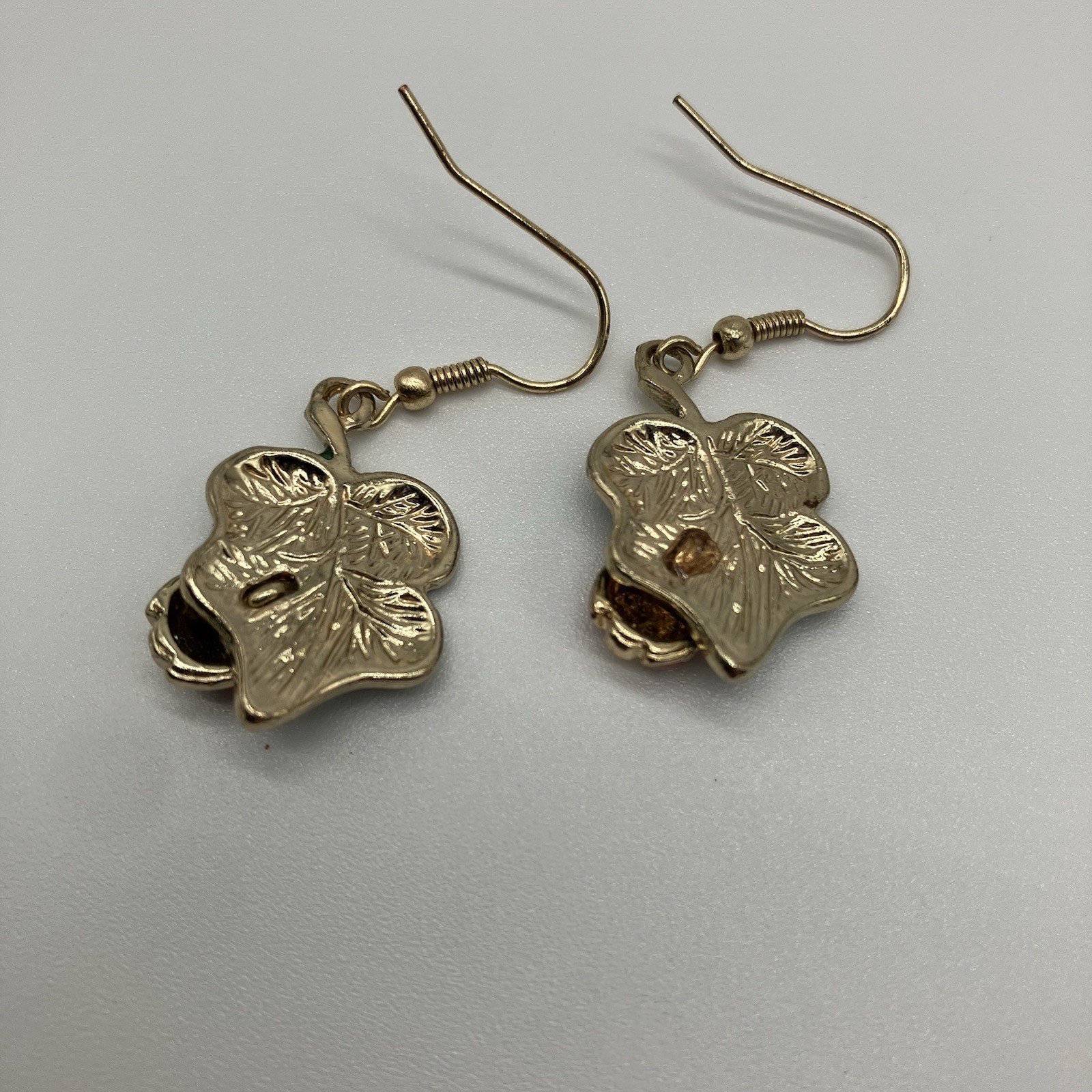 Leaf Earrings with Red Ladybug in a Green Shiny Enamel in gold plating