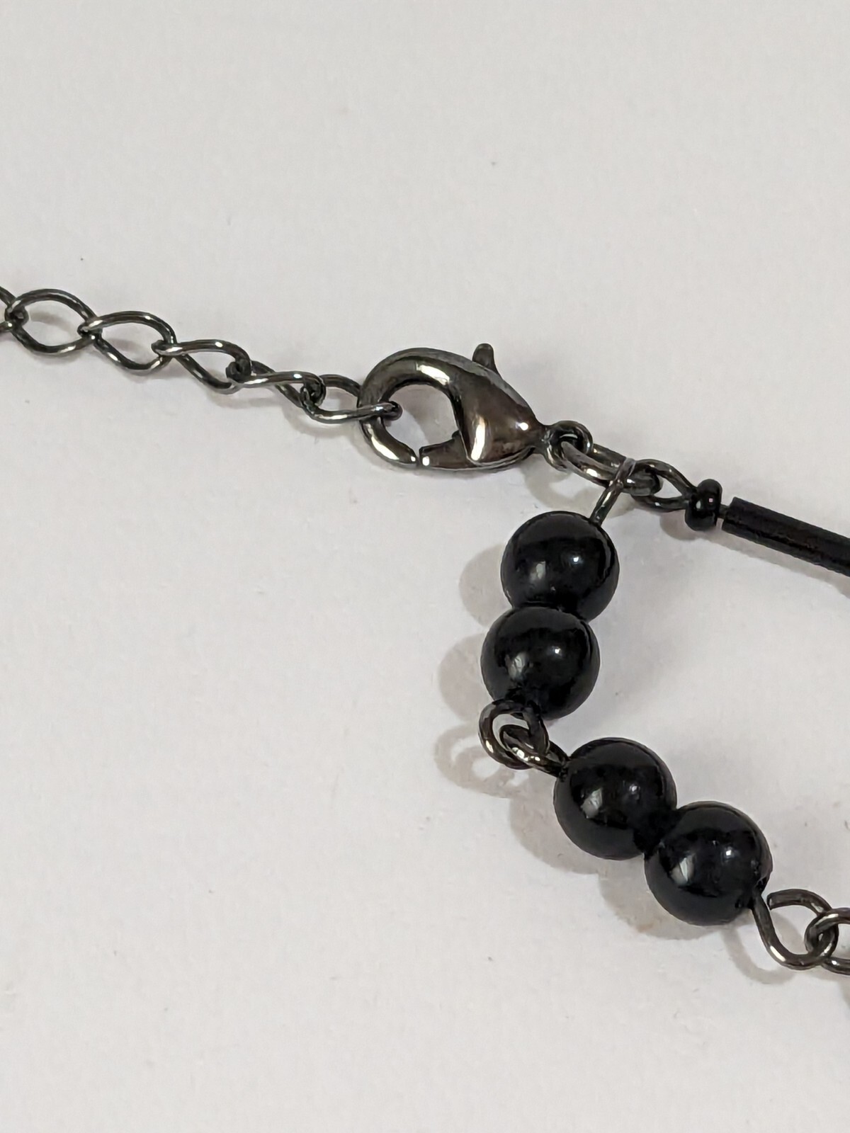 Multi Layer Gun Metal Gray Cable Link Necklace With Acrylic Black Faceted Beads.