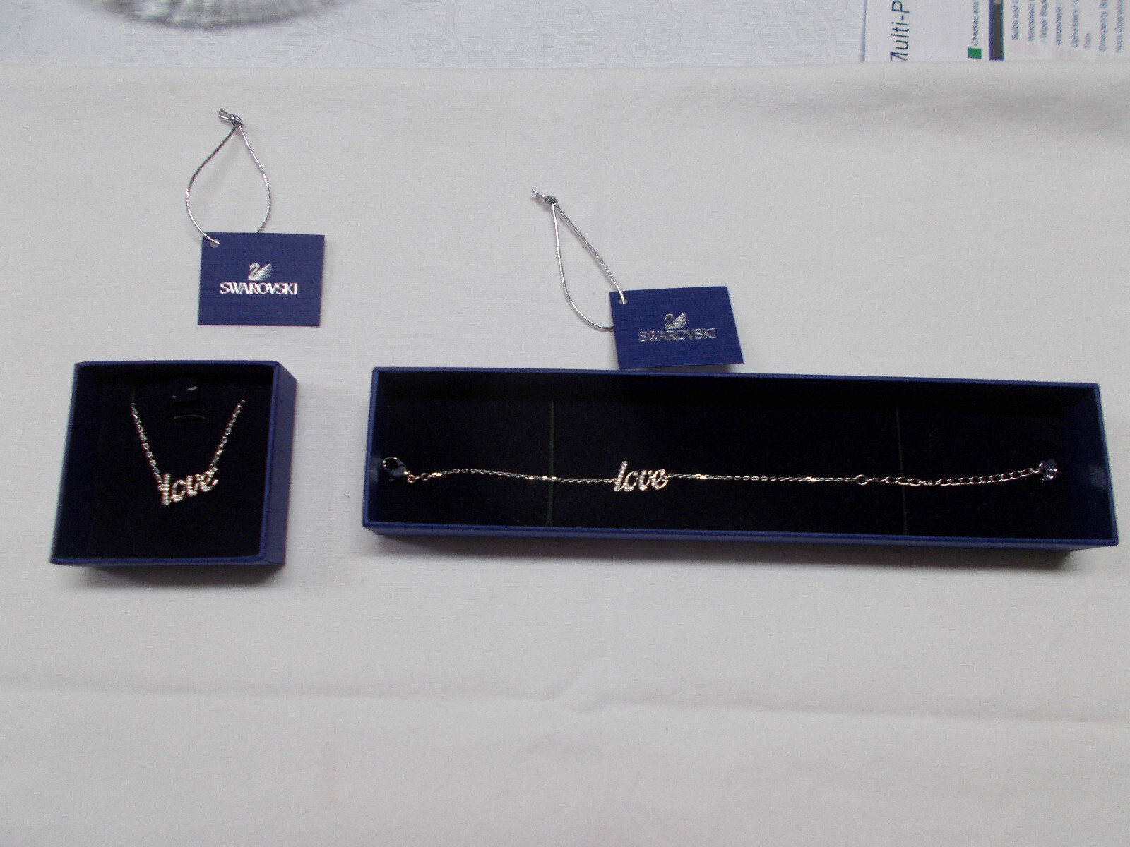 Swarovski Emotion:Bracelet Love & necklace w/swan charm & lobster hook