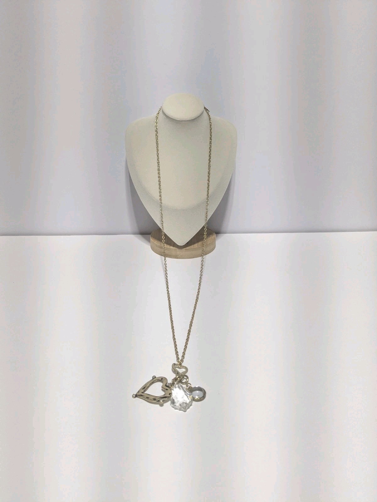 JM Marked Gold Tone Hammered & Embossed Charm Necklace With A Heart & Crystals.