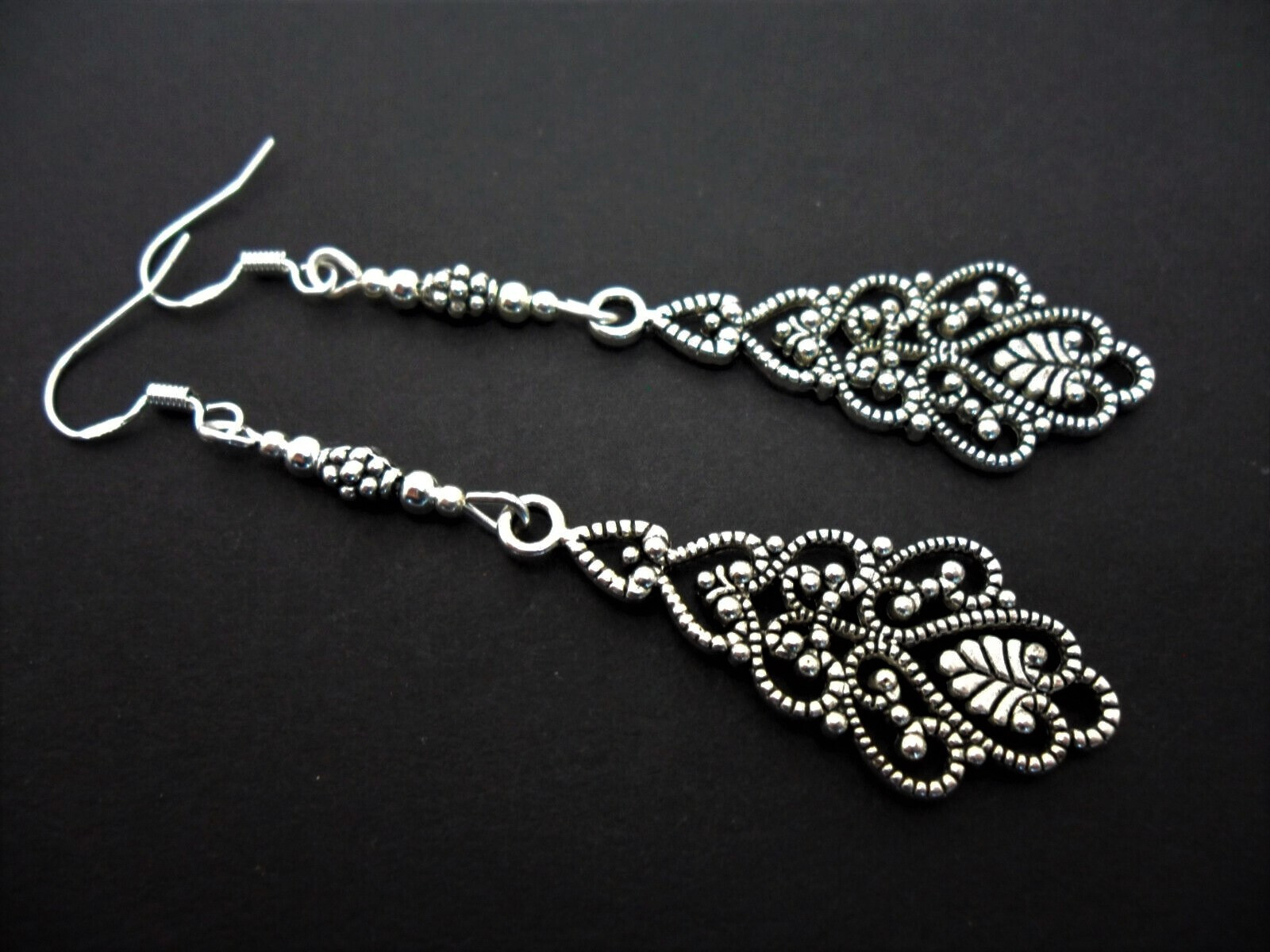 A PAIR OF TIBETAN SILVER LONG DANGLY FILIGREE 925 SILVER HOOK EARRINGS. NEW.