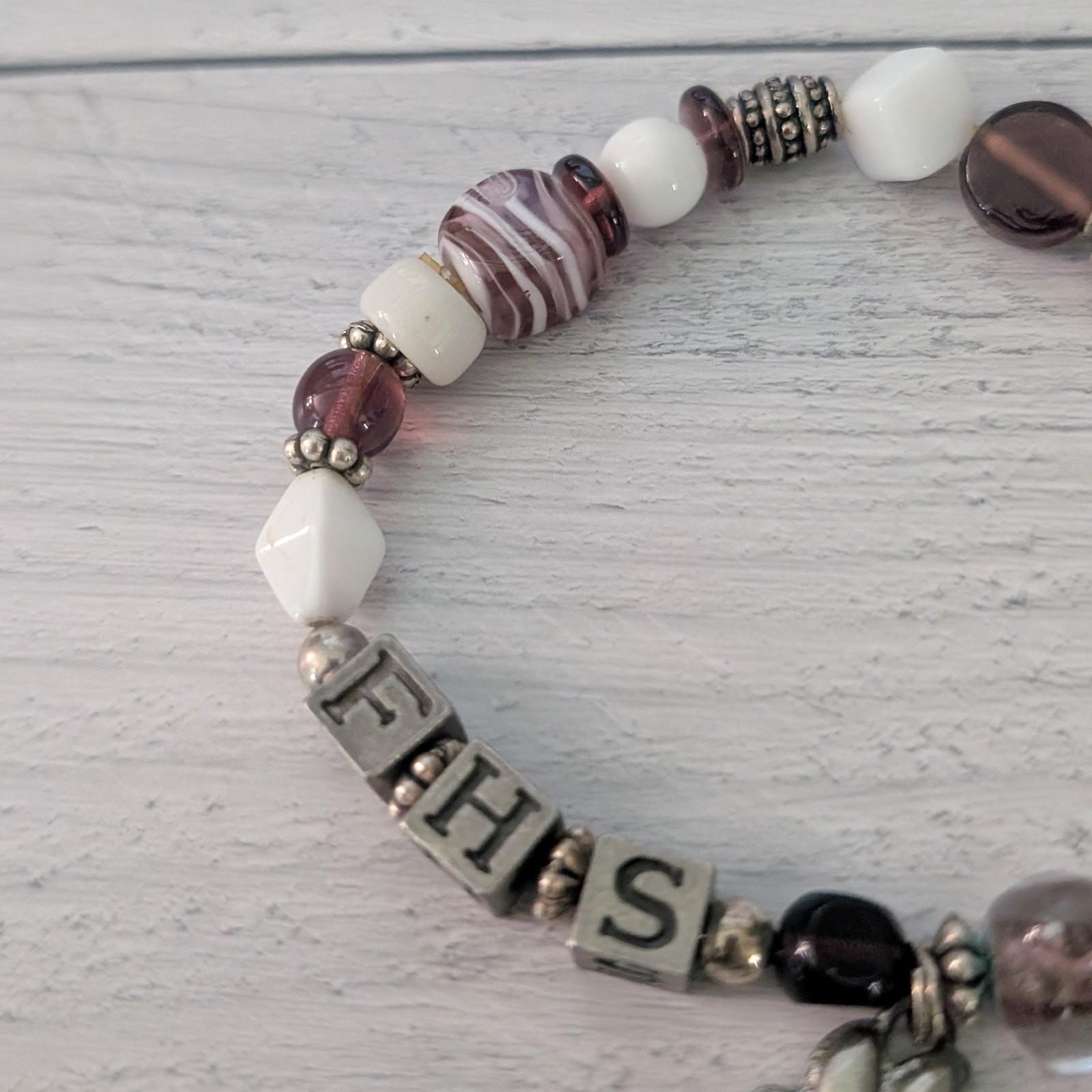 FHS with Paw Charm Stretch Bracelet – Fair Condition