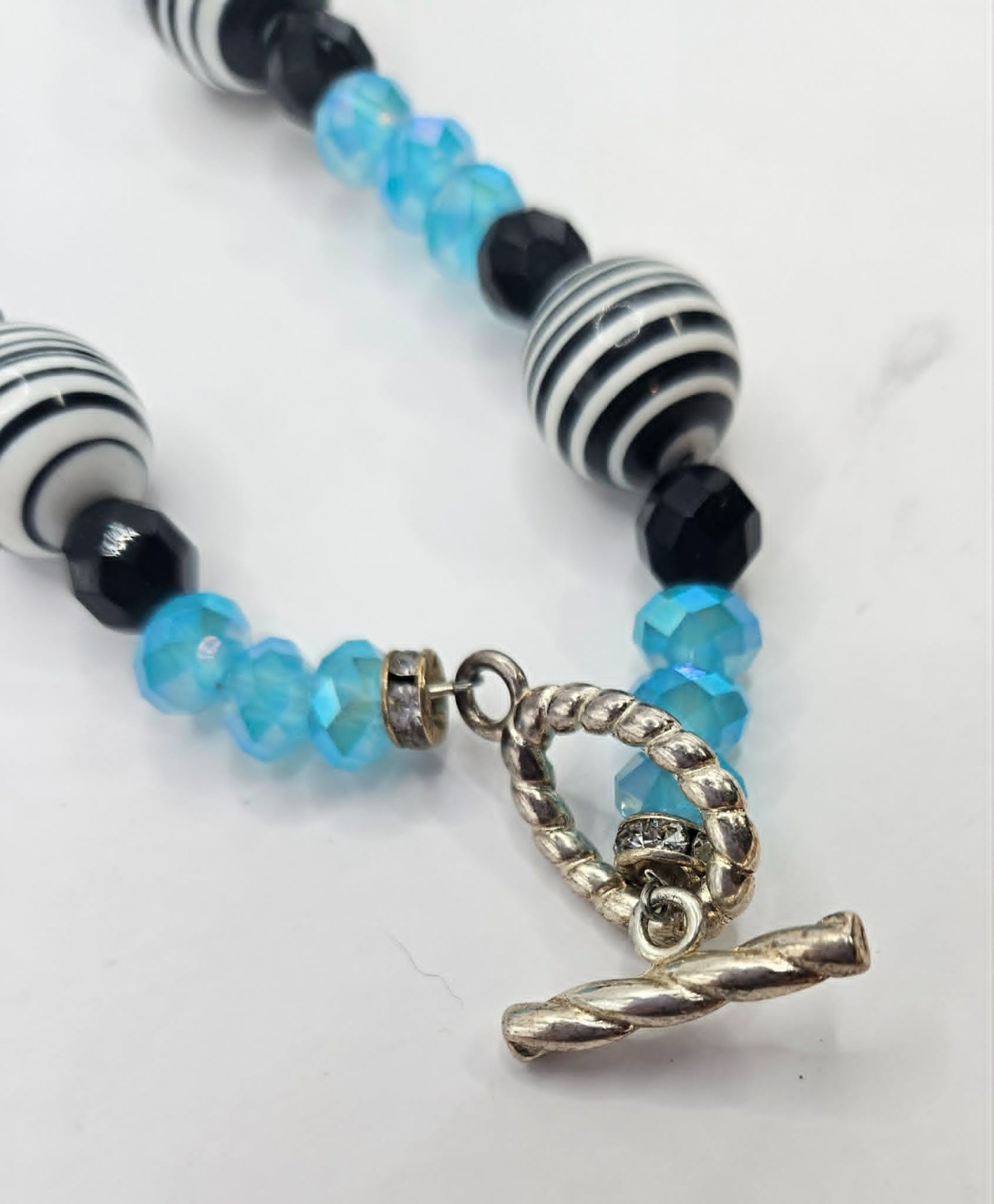 Beaded Necklace with matching bracelet black white purple light blue