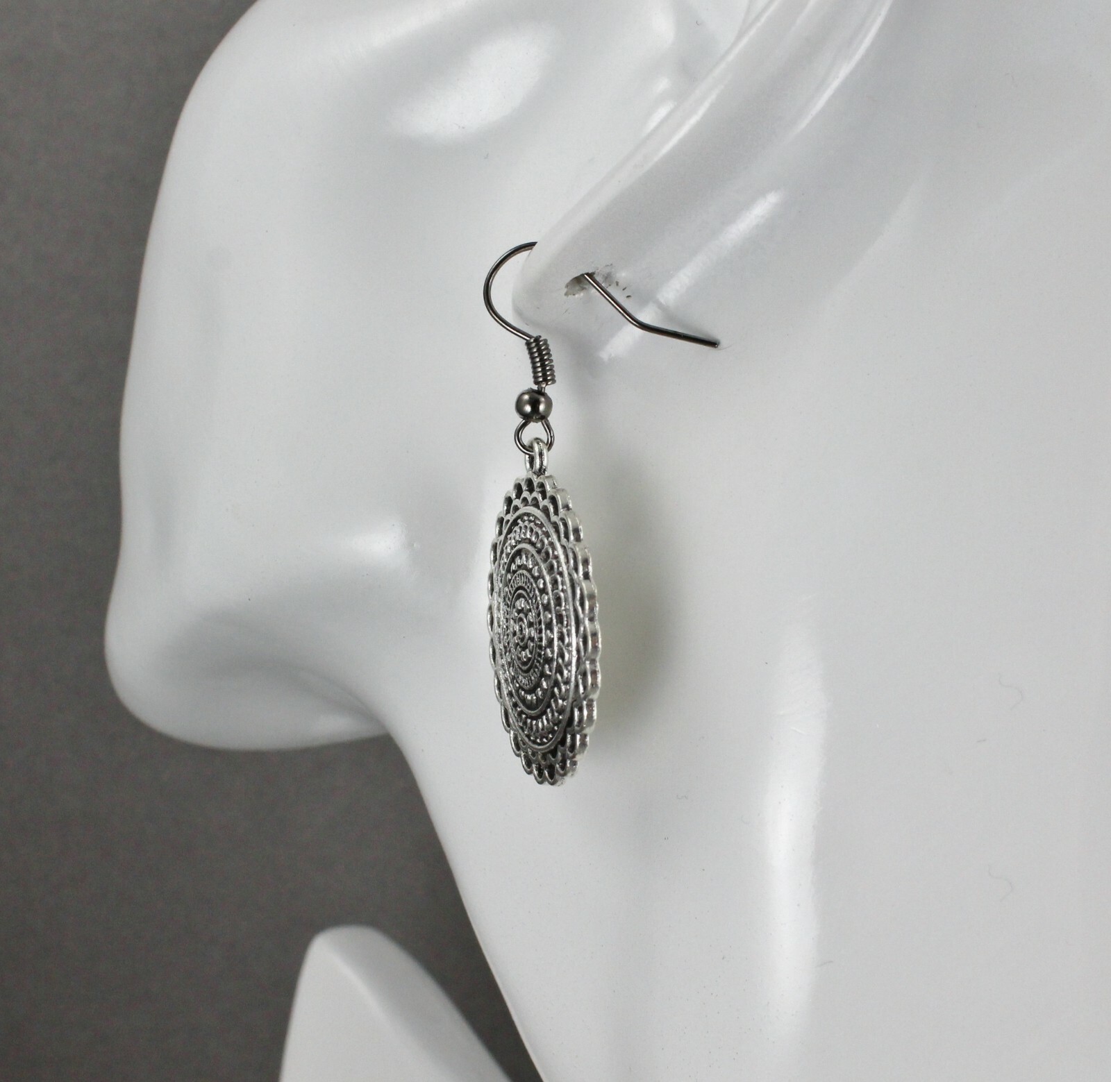 Silver stamped medallion dangle disc 1.75″ long earrings lightweight antiqued