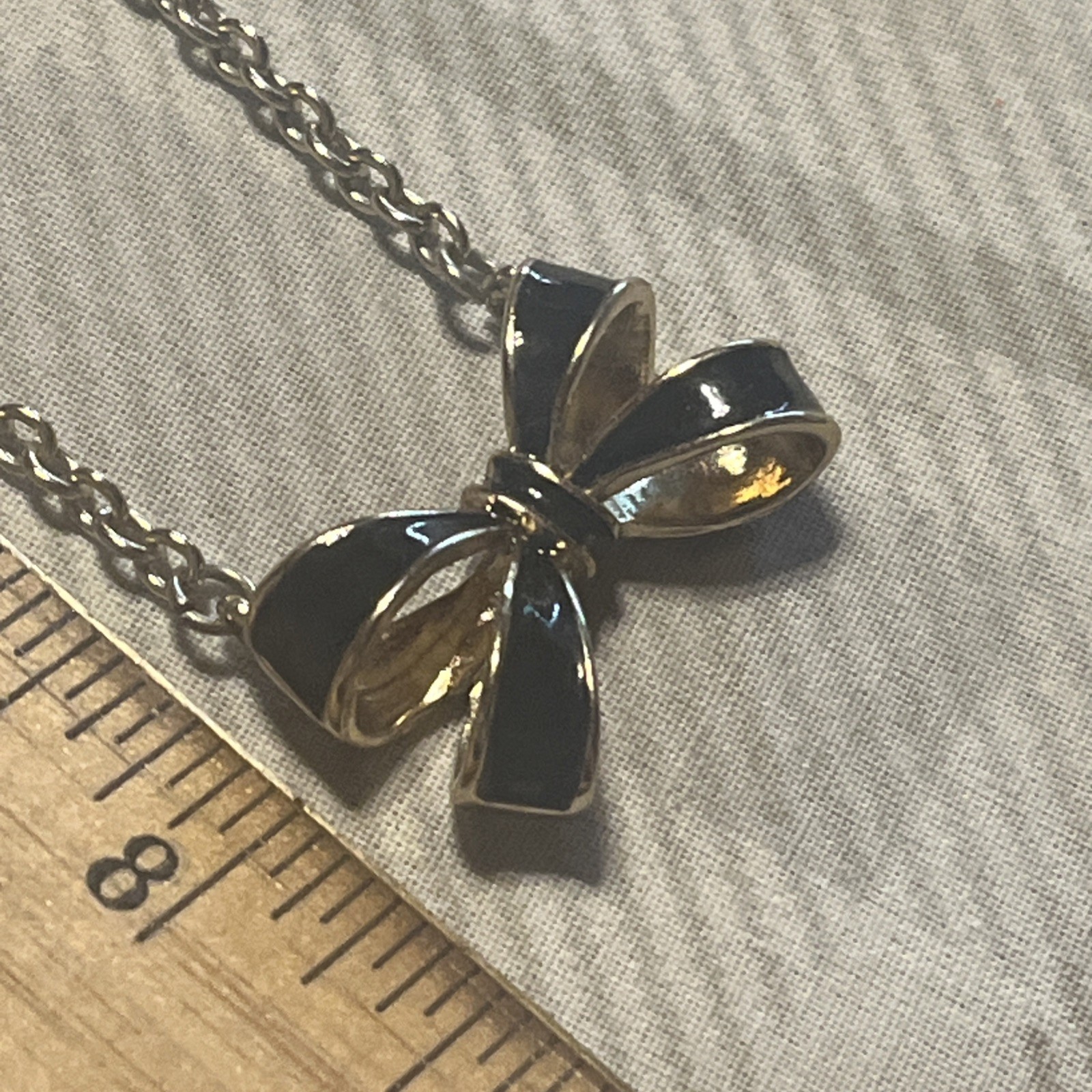 Gold Tone Black Enamel Bow Shaped Pendant Necklace Adjustable Chain 16”