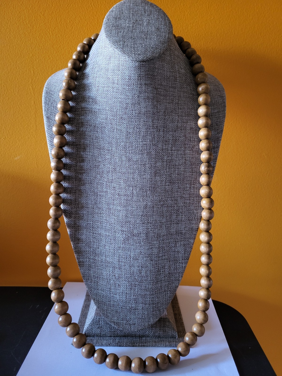 Long wooden bead necklace made of light brown beads 37in