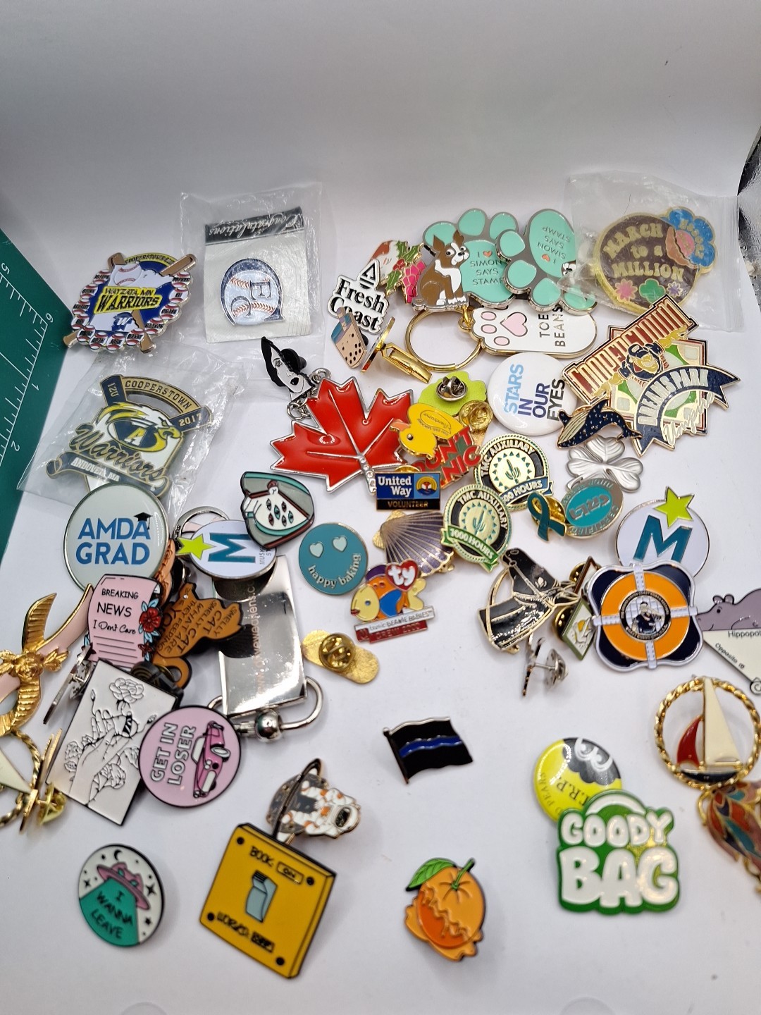 Lot of Pins & Stuff. Some Damaged.