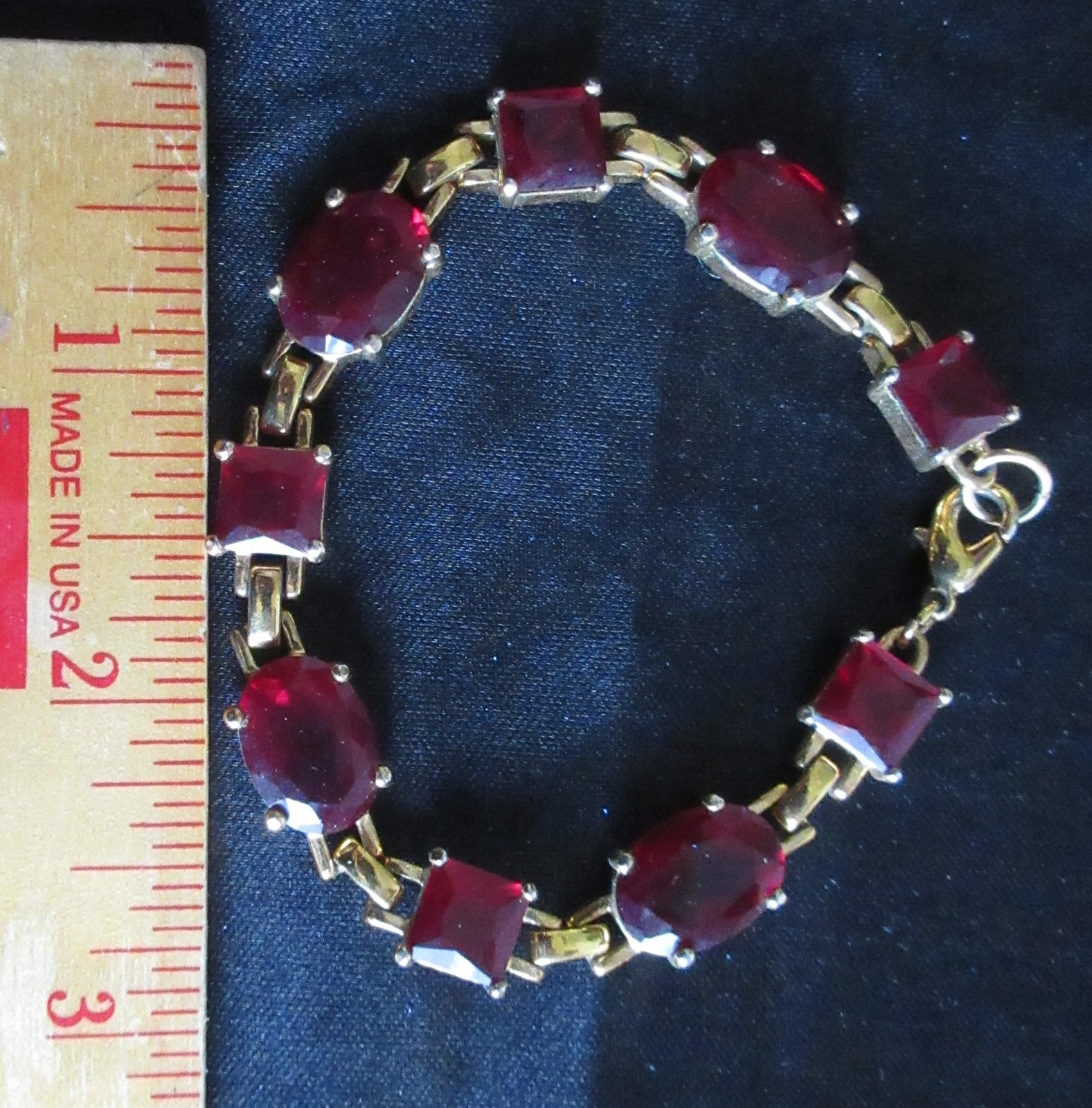Bracelet Red Faceted Square and Oval Stones Open in Back Lobster Claw Closure