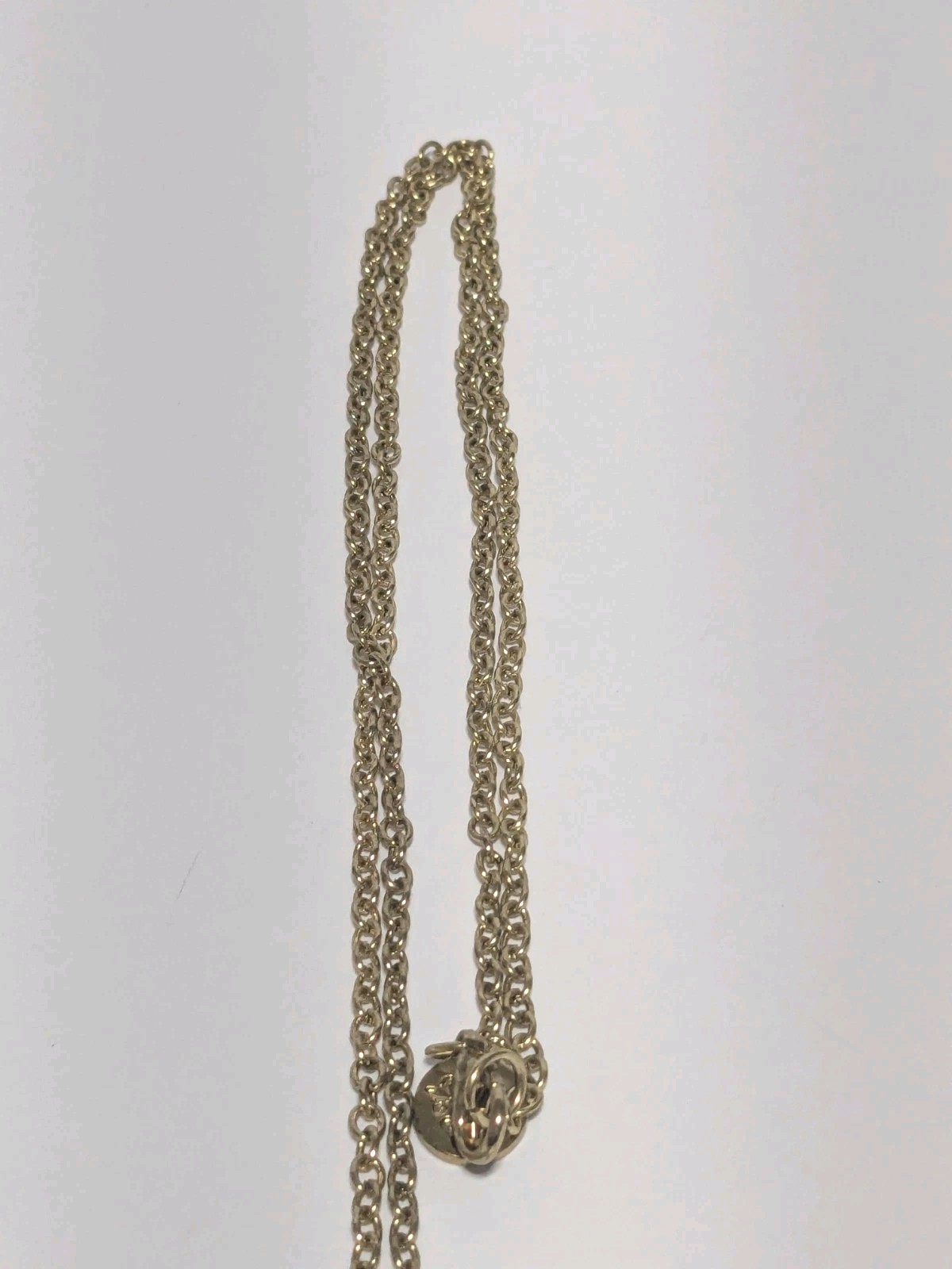 JM Marked Gold Tone Hammered & Embossed Charm Necklace With A Heart & Crystals.