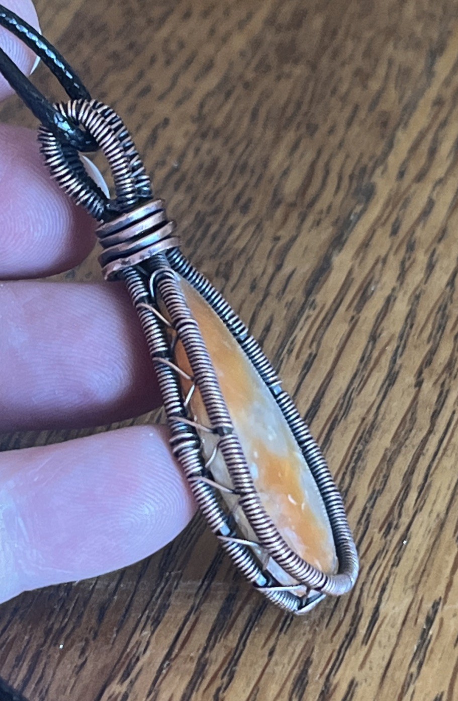 Orange Calcite ~ Handmade copper wire wrapped pendant 1g