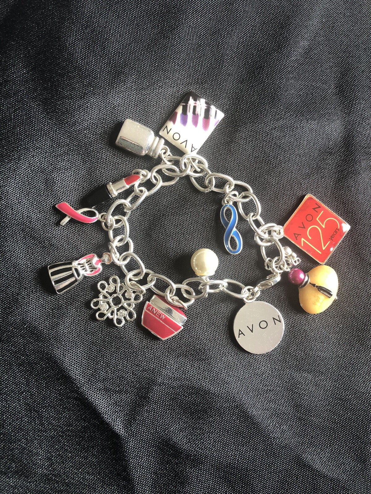 AVON Charm Bracelet 125th Anniversary Silver tone 9″ 12 Charms Adjustable B4