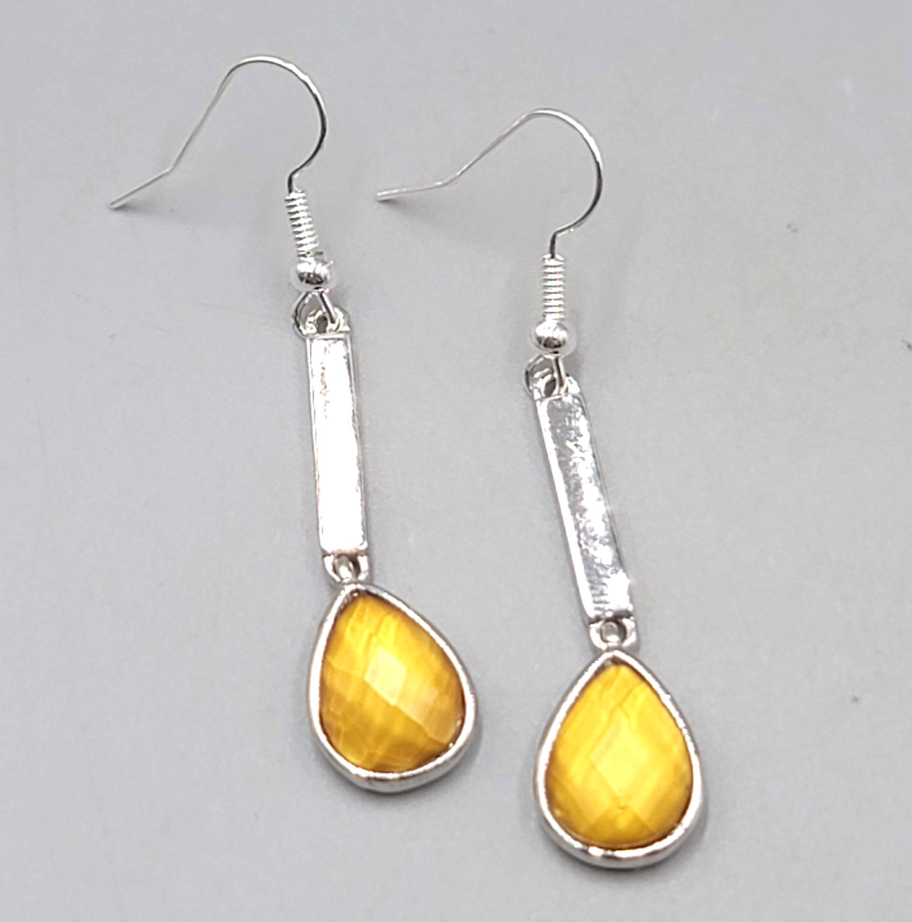 Faceted Yellow Teardrop Pierced Earrings Silver tone Dangle 2 3/8 in