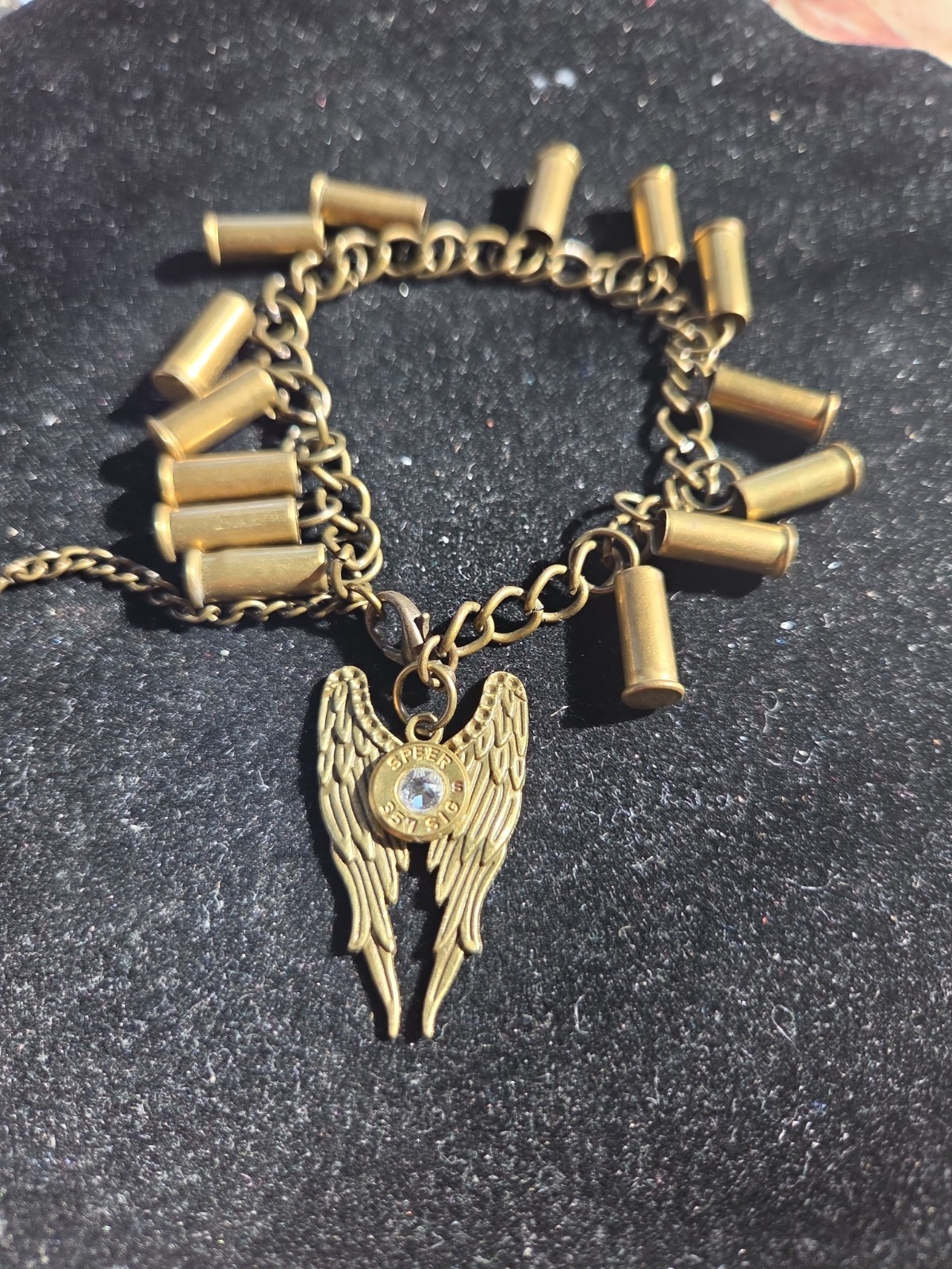 Bullet casing. Bracelet ricelet brass with angel wings