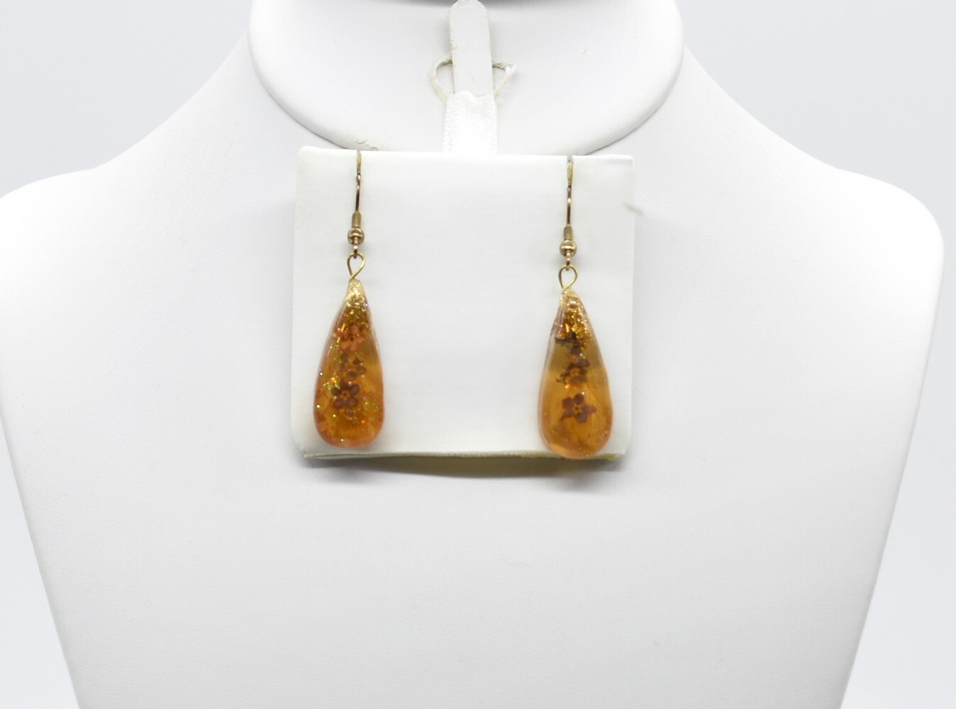 2 1/8″ Gold Glitter & Tiny Blue Forget-Me-Nots in Faux Amber Resin Hook Earrings