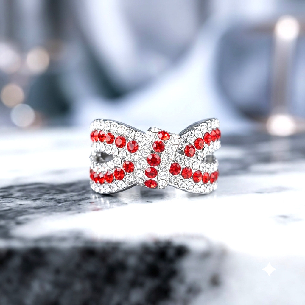 Women’s stainless steel wedding ring with a synthetic red cubic zirconia stone,