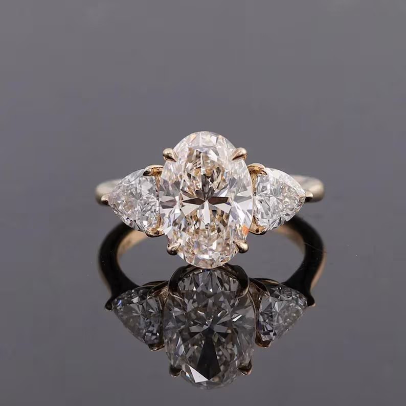 Fancy Three Stone Ring 2.50Ct Oval Cut Simulated Diamond 14K Yellow Gold Plated
