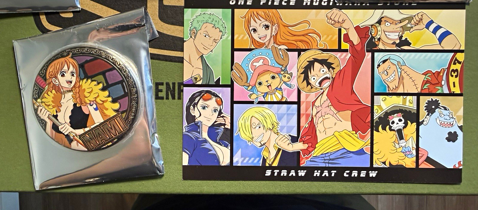 One piece Nami Egghead badge and Mugiwara postcard