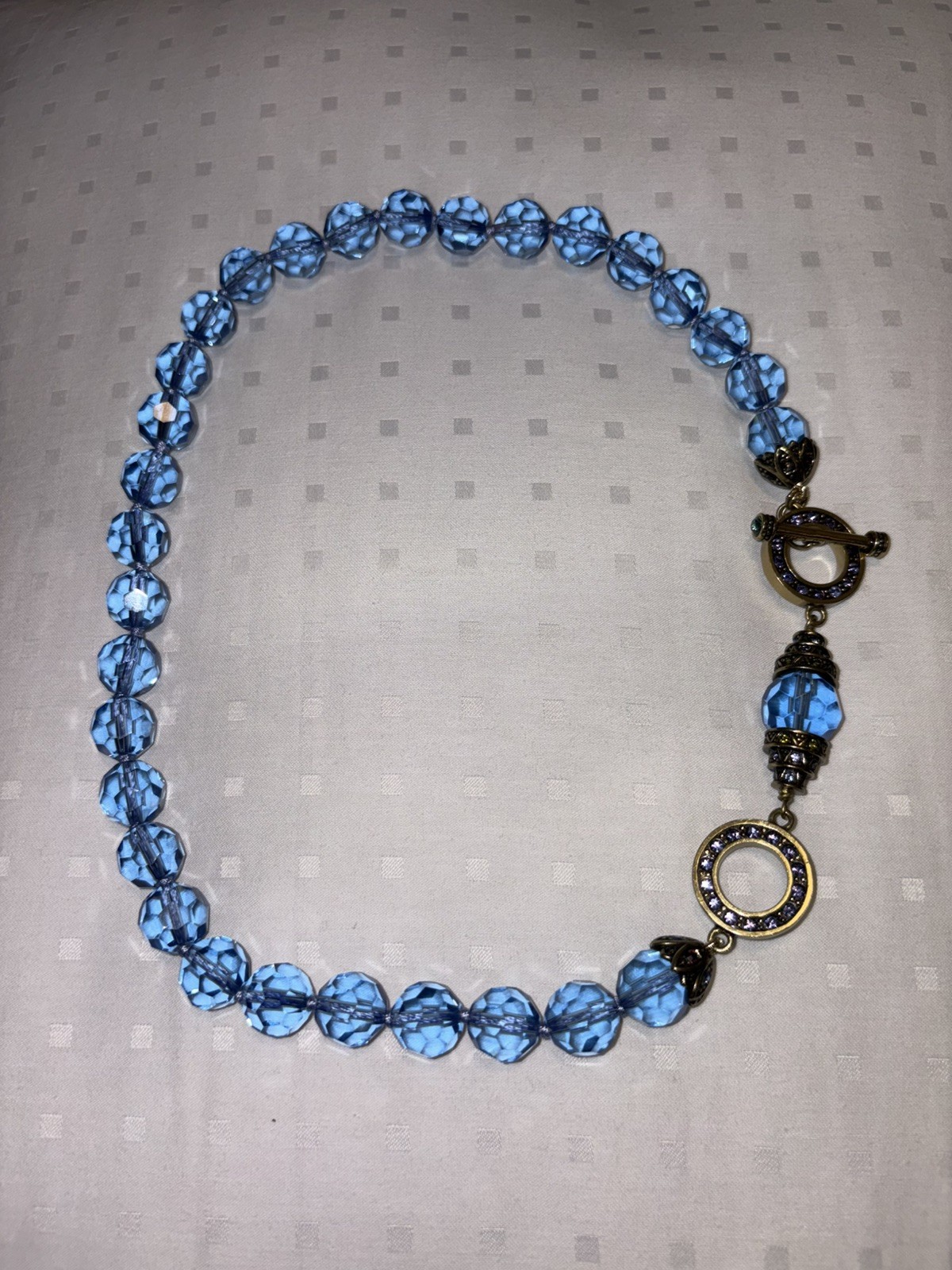Heidi Daus “AB Crystal Blue” Beaded Toggle Necklace