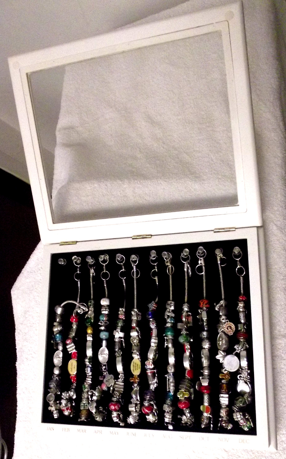 Pre Owned Willabee & Ward 12-Month Holiday Charm Bracelets Complete Wood Case