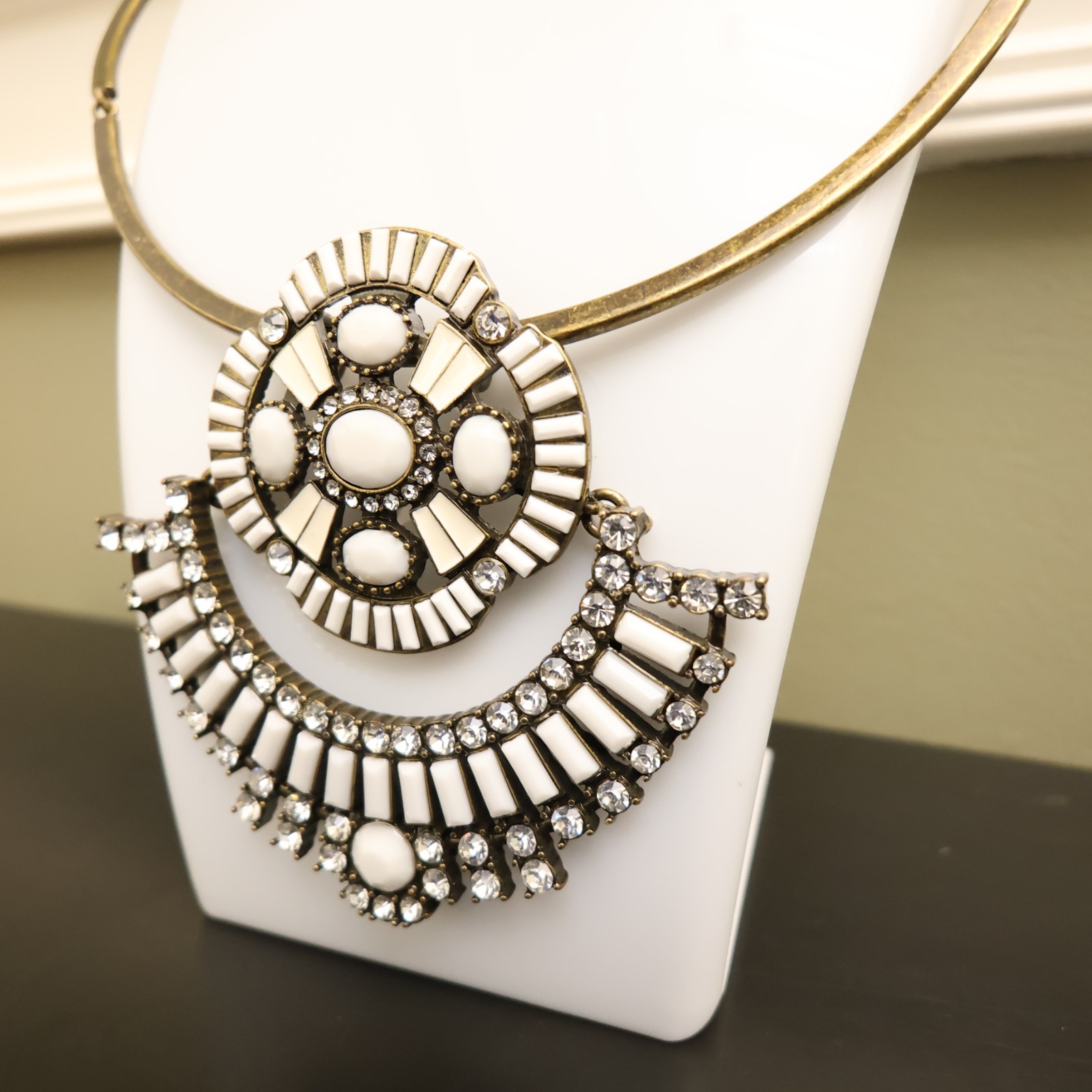 Logo Links necklace Lori Goldstein ivory crystals statement collar bronzetone