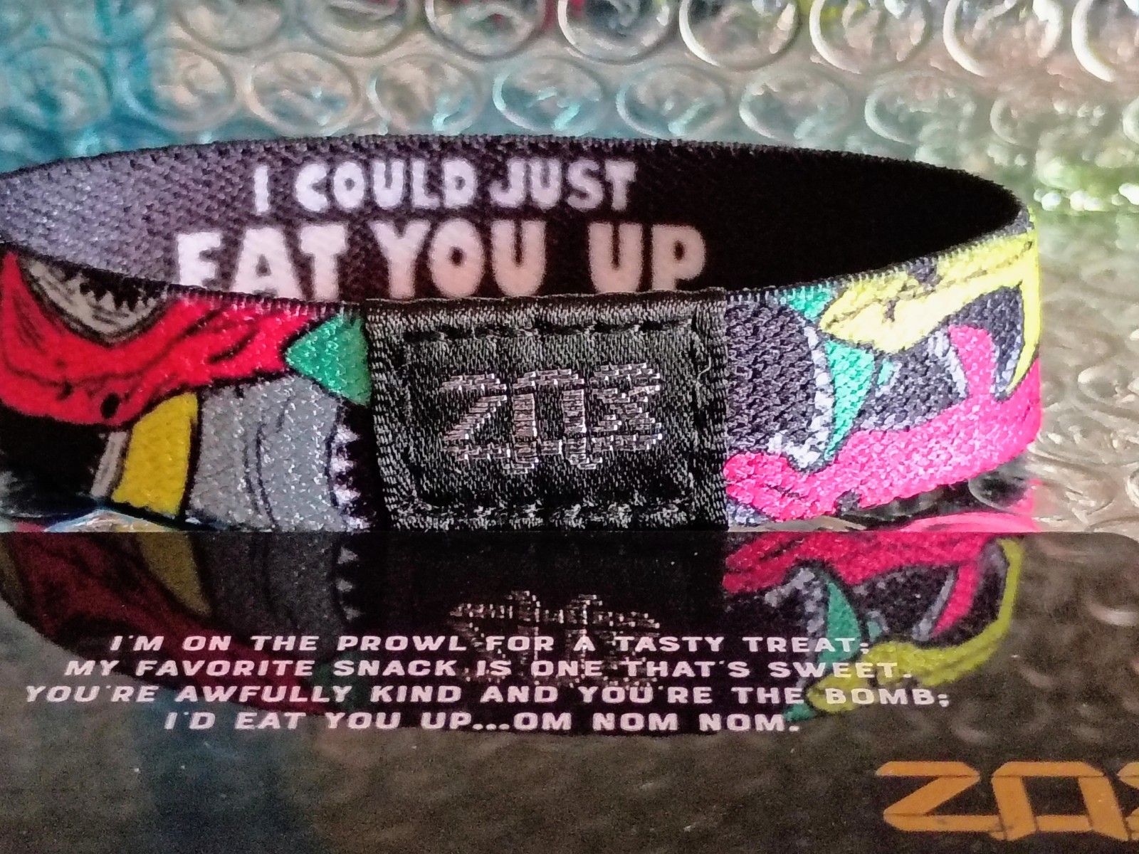 ZOX “I COULD JUST EAT YOU UP” Strap W/ Card. (Size Medium) -Silver