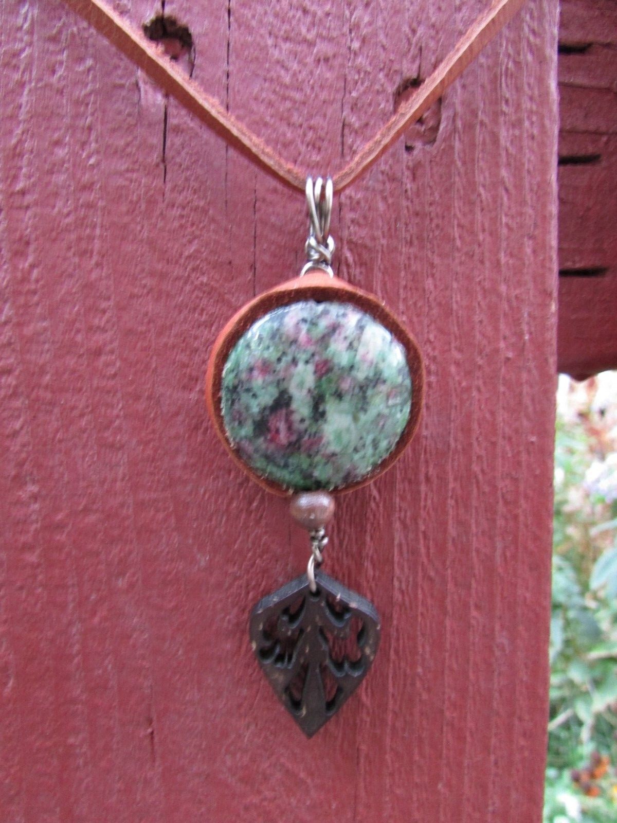 Ruby Zoisite and wood Pendant. Wire wrapped with Leather trim, 