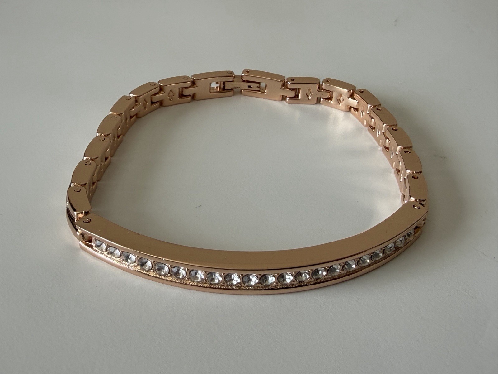 ROSE GOLD TONE RHINESTONE BAR LINK STRETCH BANGLE BRACELET WOMENS APPROX 7 IN