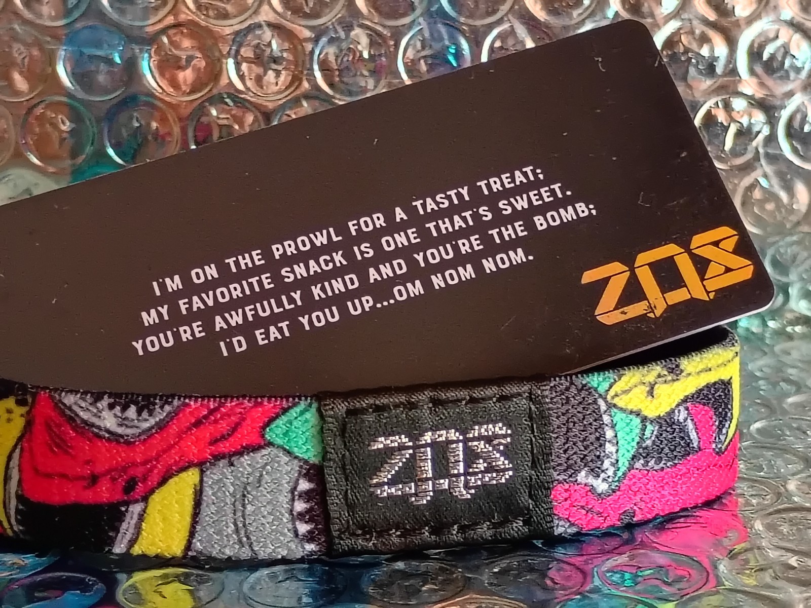 ZOX “I COULD JUST EAT YOU UP” Strap W/ Card. (Size Medium) -Silver