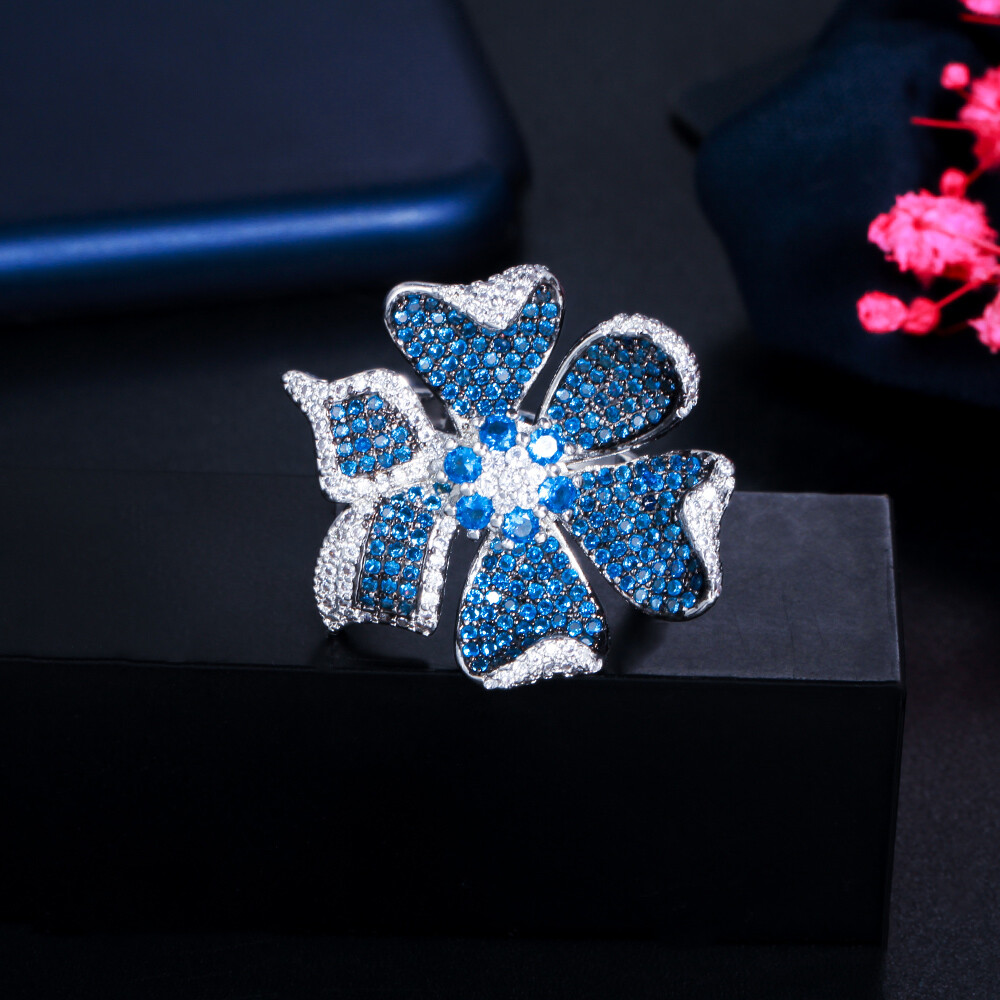 Adjustable 3D Geometric Flower Pave Setting Blue Cubic Zirconia Engagement Ring