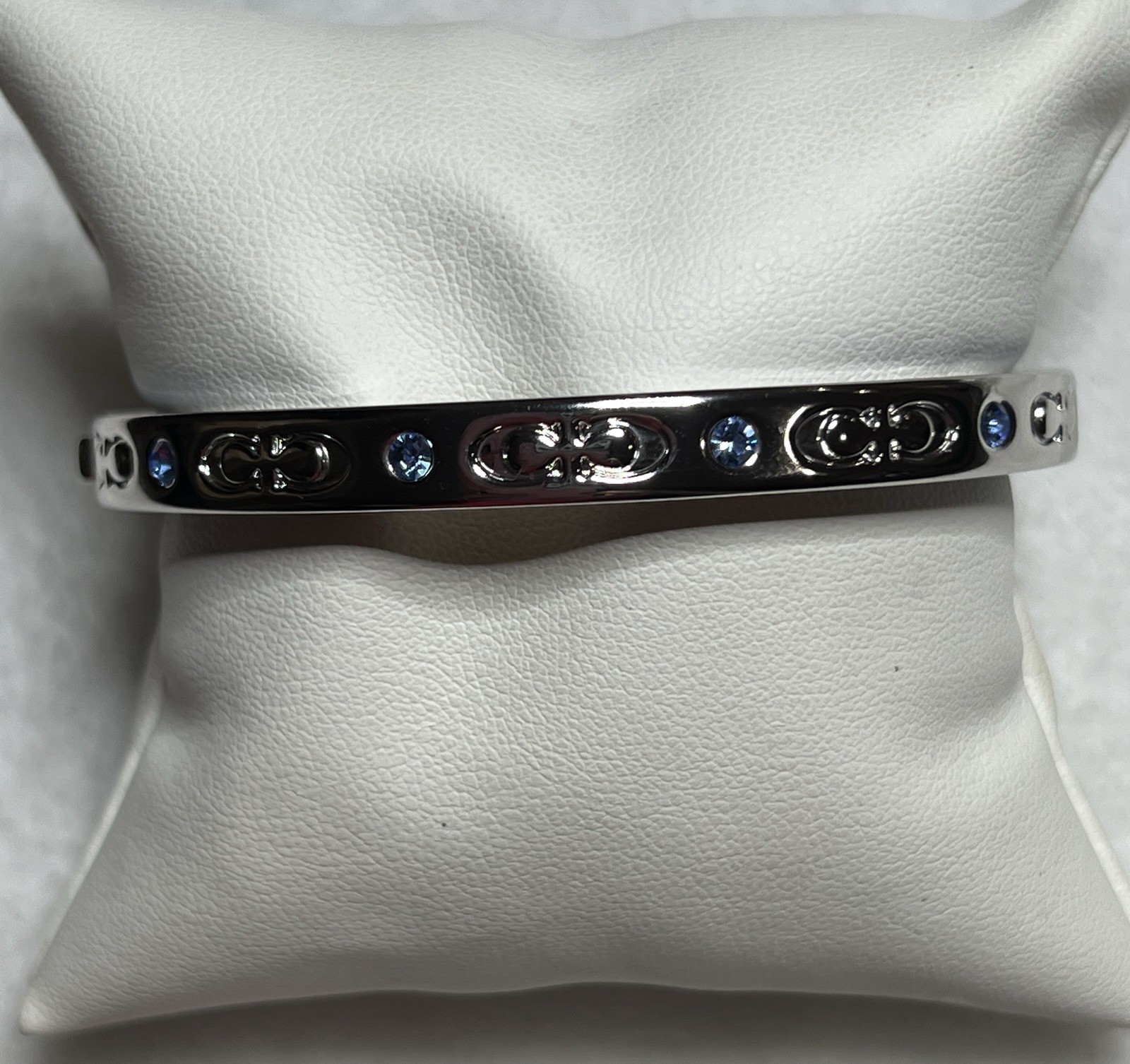Coach Kissing C Hinged Bangle Bracelet Silver with Pool Crystal Accents – F59083