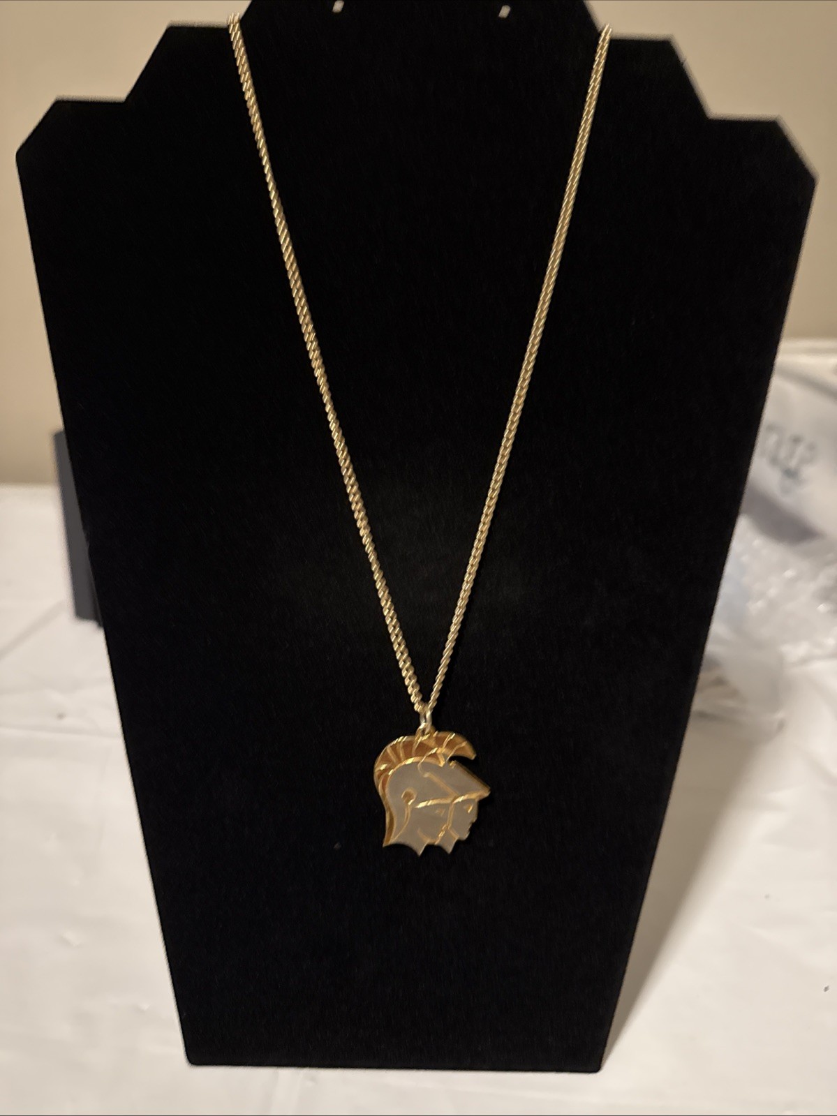 Gemini Pendant On Gold Tone Chain.