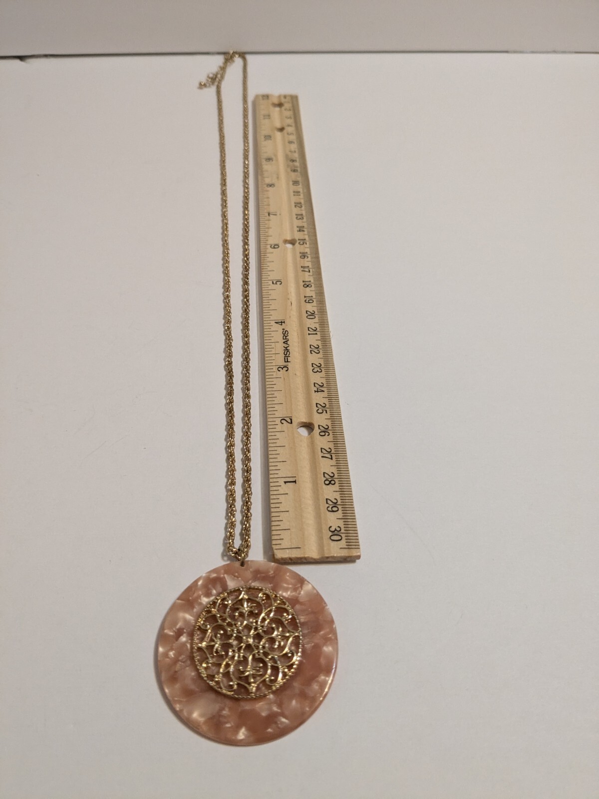 Peach Faux Shell Medallion Pendant Gold Tone Necklace. Metal Scroll Work. 30″.