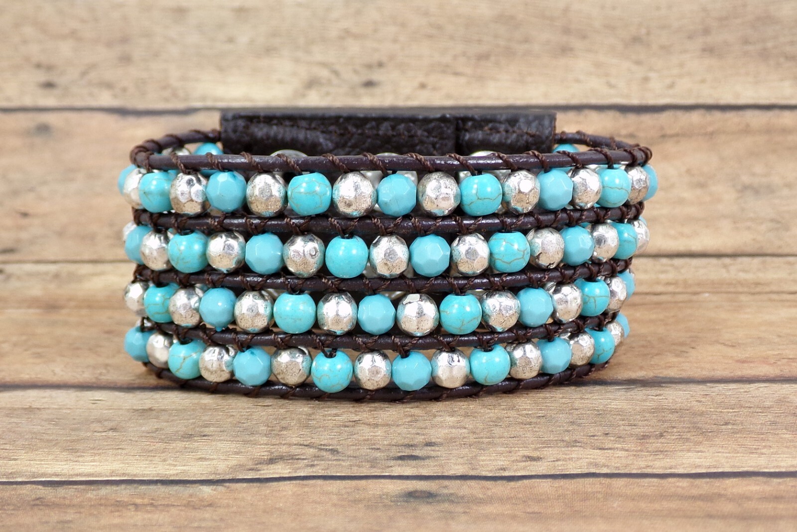 Wide turquoise and silver beaded leather bracelet , snap closure, brown leather