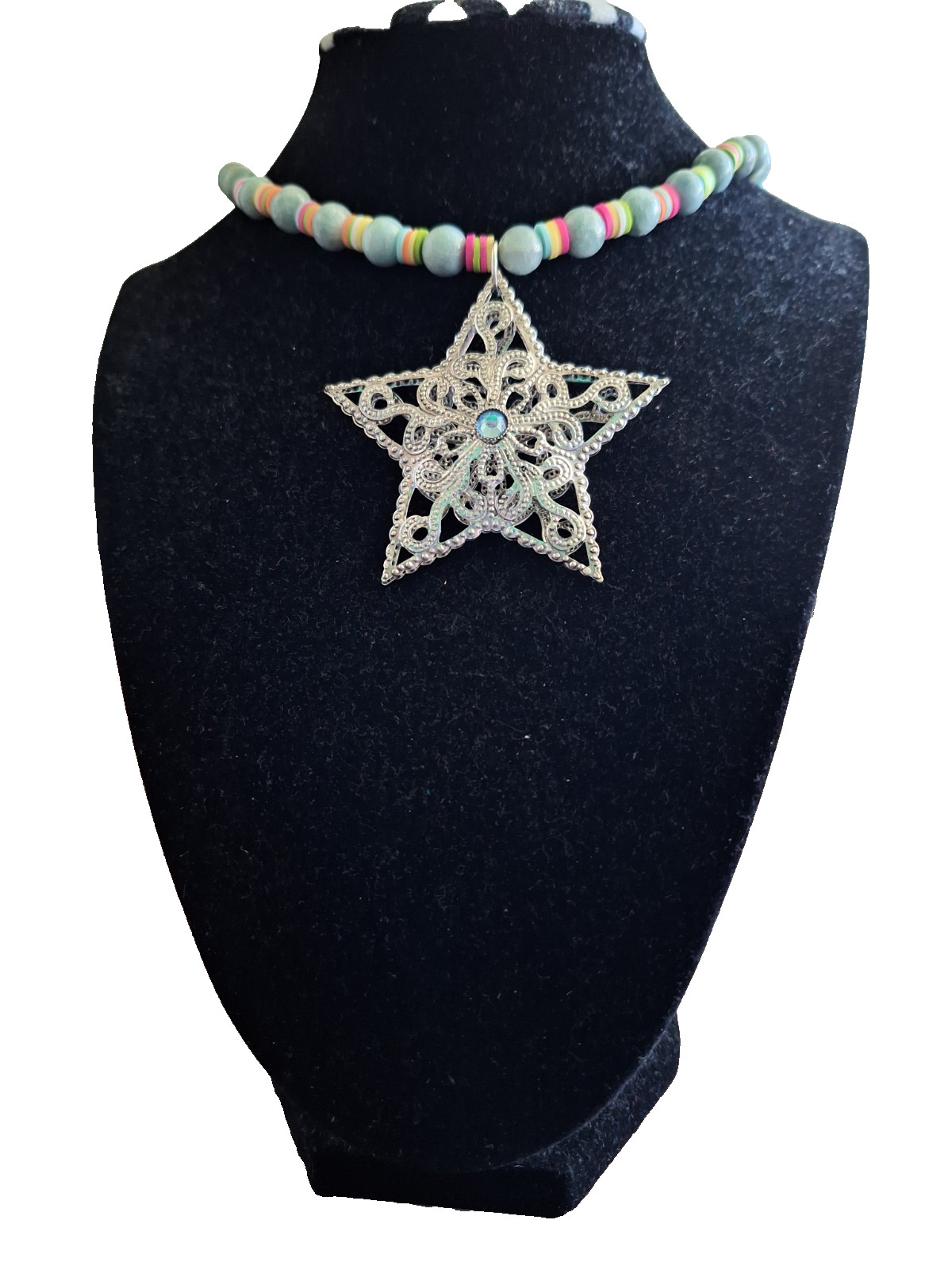 14 inch necklace with a star and multicolored and blue grey beads